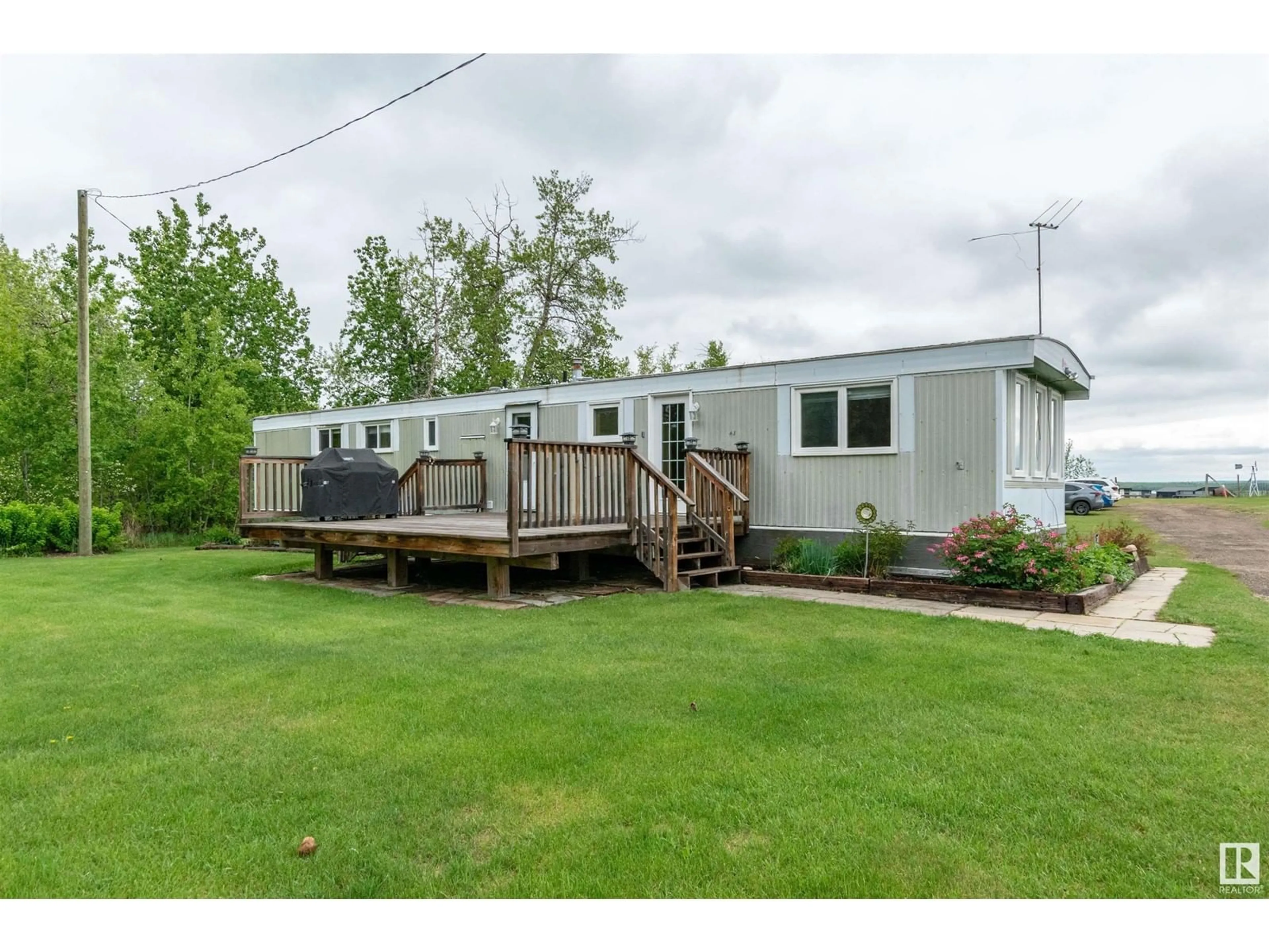A pic from outside/outdoor area/front of a property/back of a property/a pic from drone, water/lake/river/ocean view for 169 53110 RGE ROAD 213, Rural Strathcona County Alberta T8G2C3