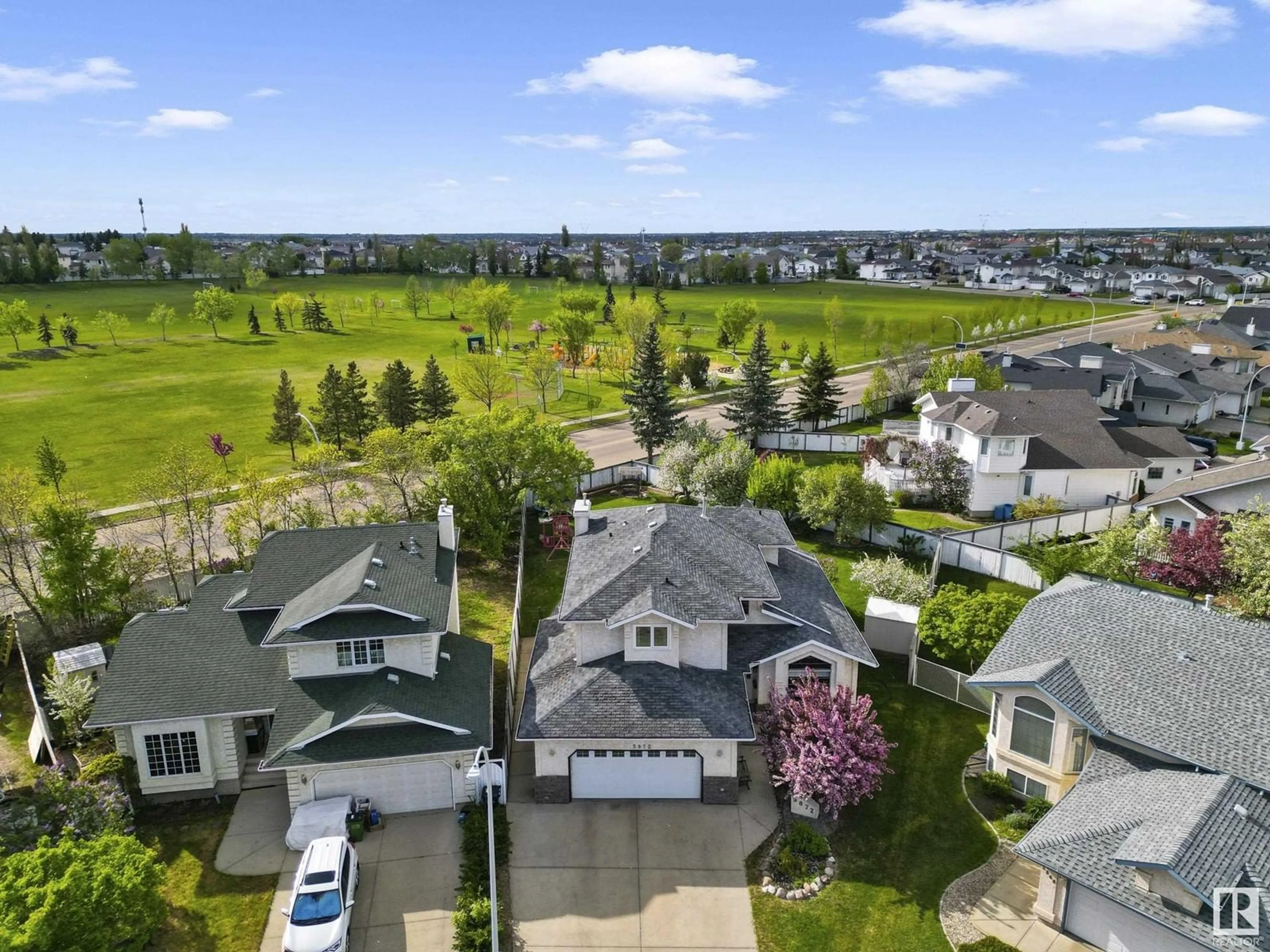 A pic from outside/outdoor area/front of a property/back of a property/a pic from drone, unknown for 5872 159B AV, Edmonton Alberta T5Y2R5