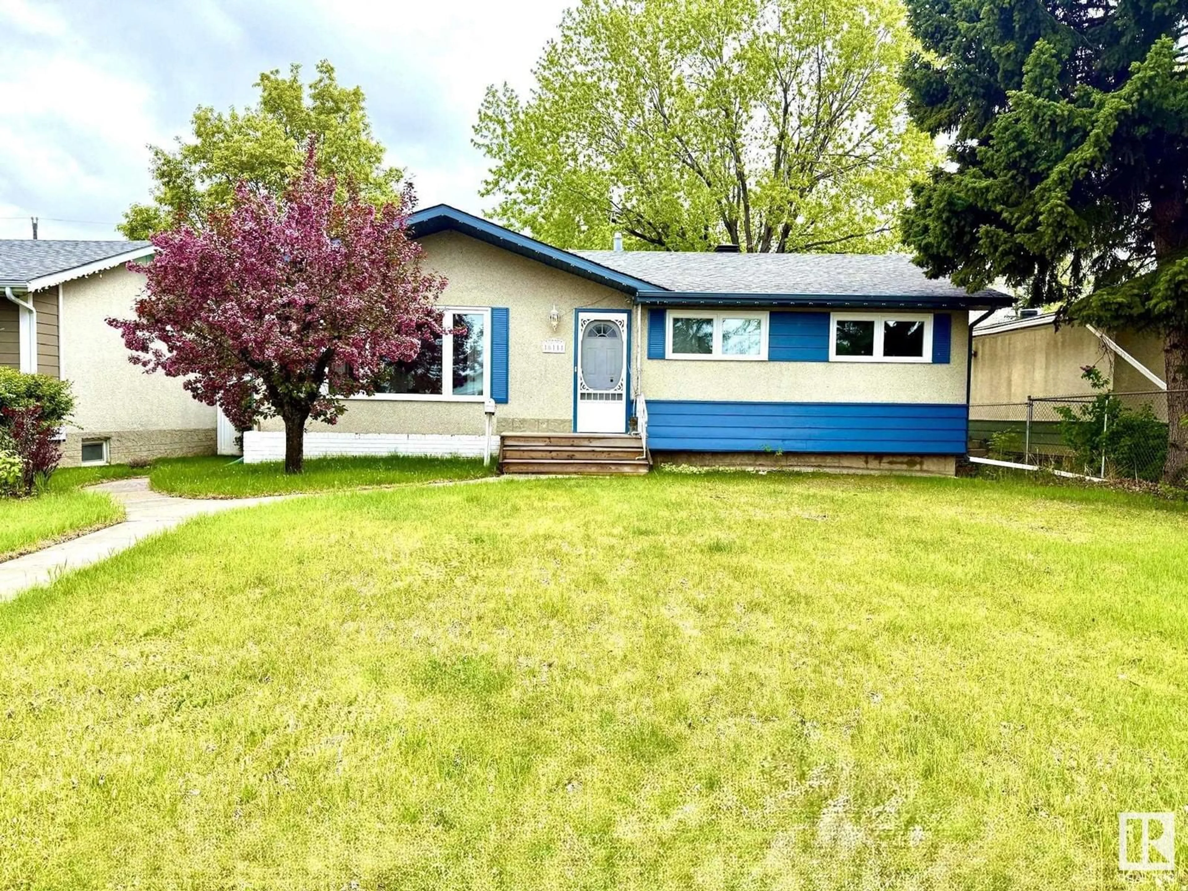 Home with vinyl exterior material, street for 16111 80 AV, Edmonton Alberta T5R3M5