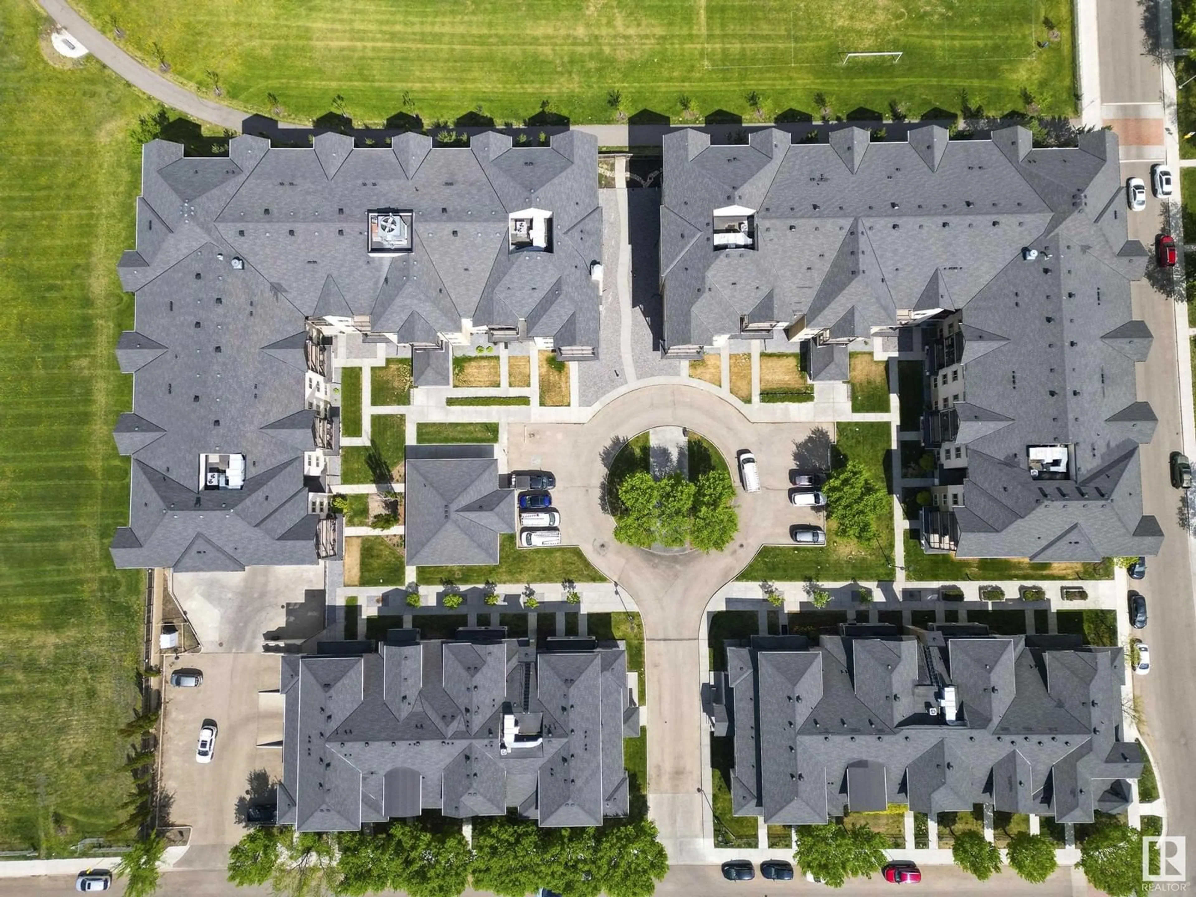 A pic from outside/outdoor area/front of a property/back of a property/a pic from drone, street for 106 - 10540 56 AV, Edmonton Alberta T6H0X7