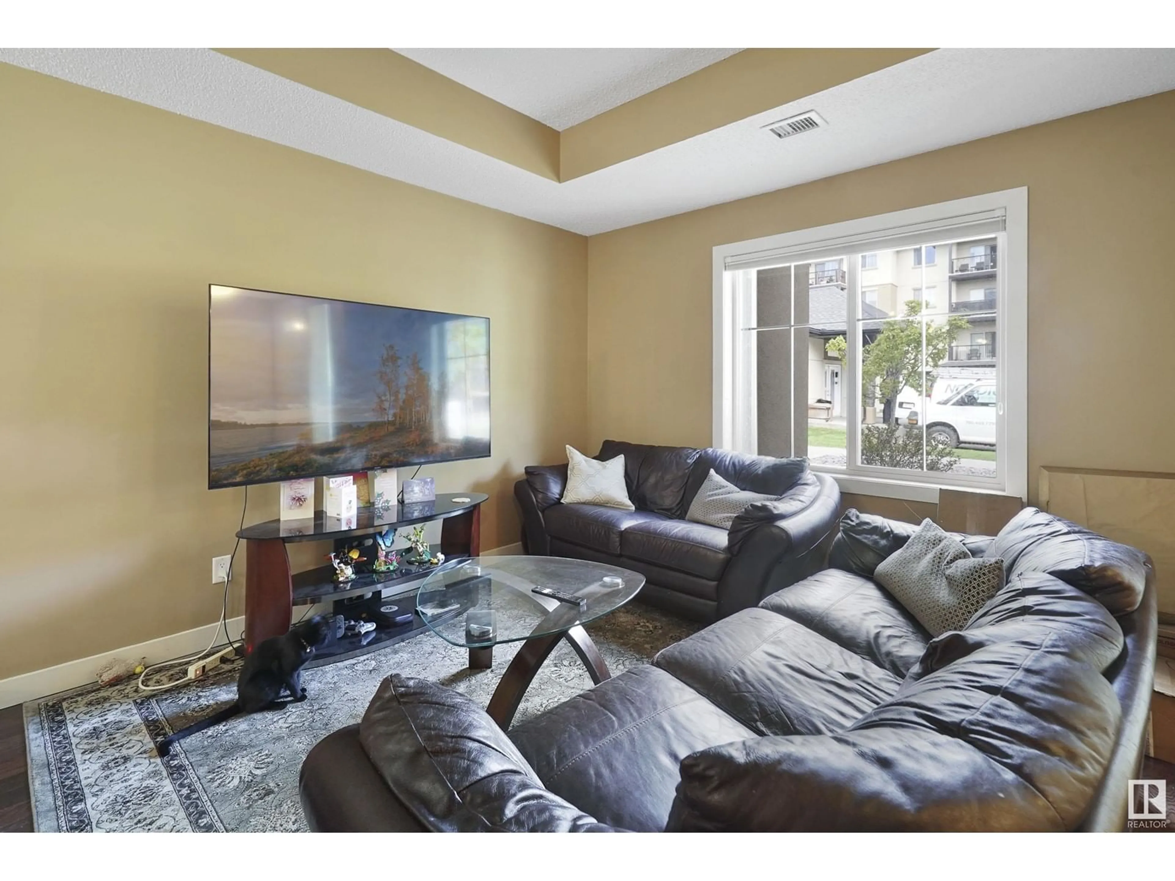 Living room with furniture, unknown for 106 - 10540 56 AV, Edmonton Alberta T6H0X7