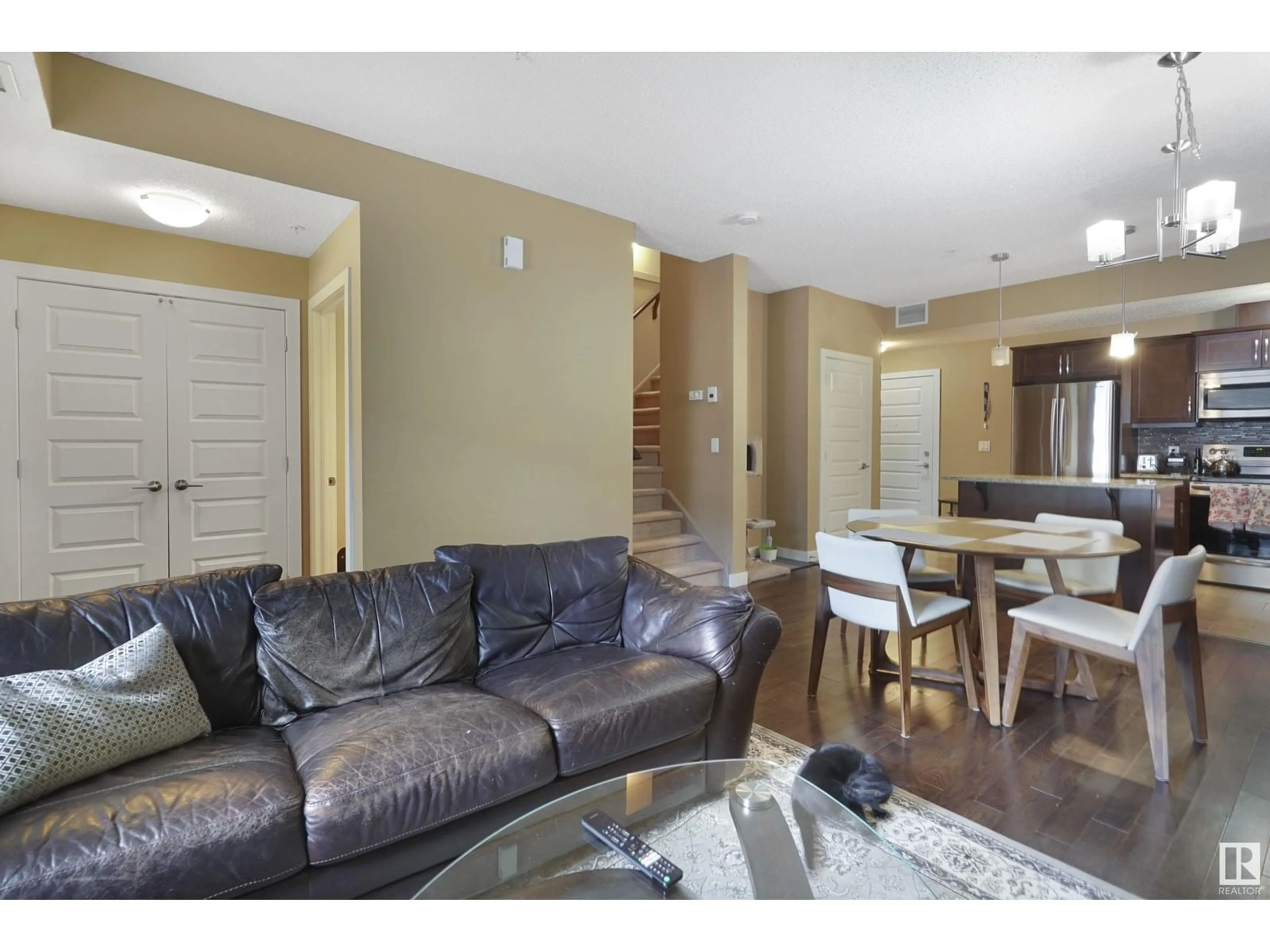 Living room with furniture, unknown for 106 - 10540 56 AV, Edmonton Alberta T6H0X7