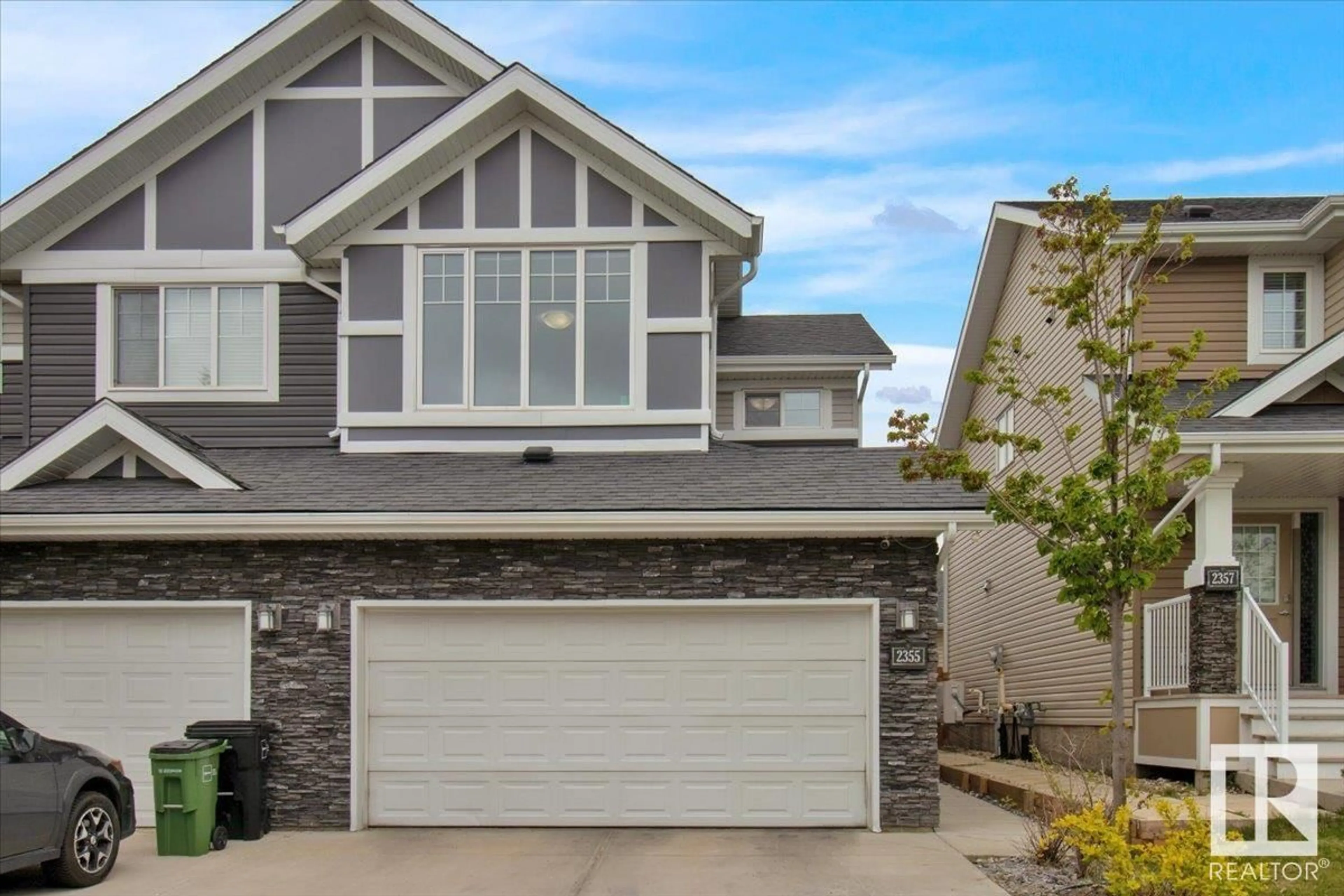 Home with vinyl exterior material, street for 2355 GLENRIDDING BV, Edmonton Alberta T6W2T2