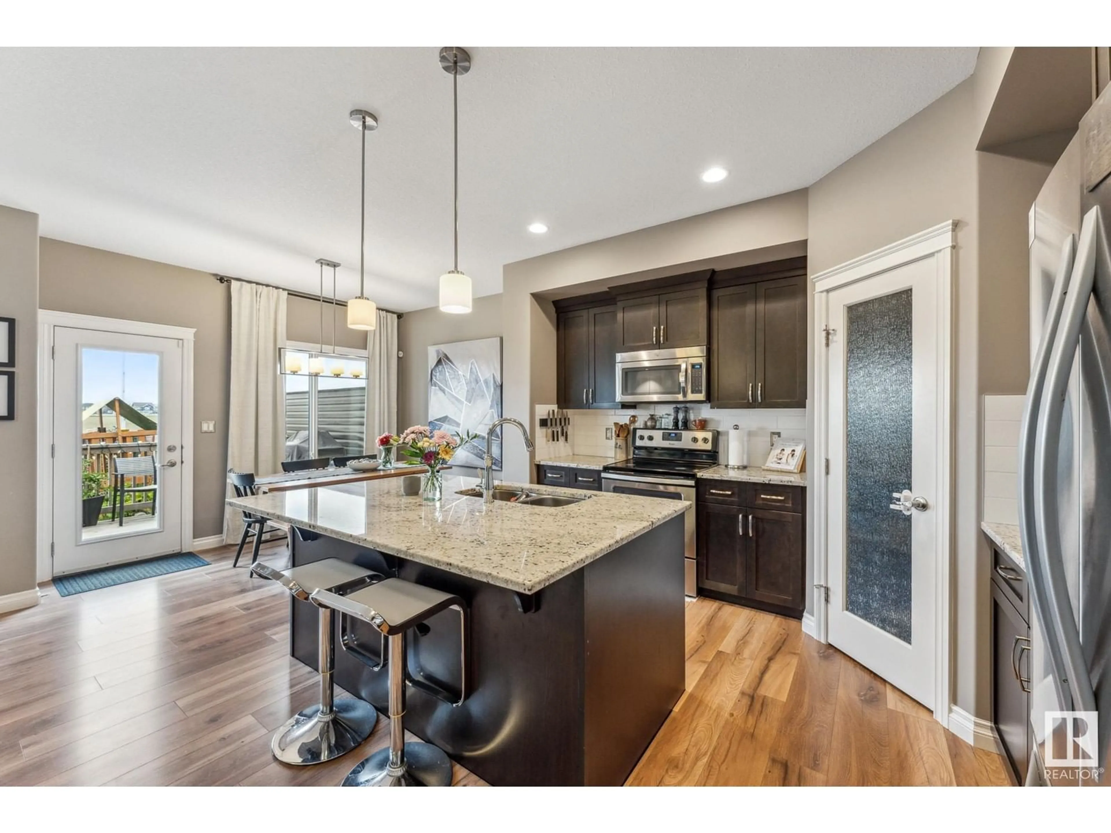 Open concept kitchen, unknown for SW - 2806 KOSHAL CR, Edmonton Alberta T6W3J7