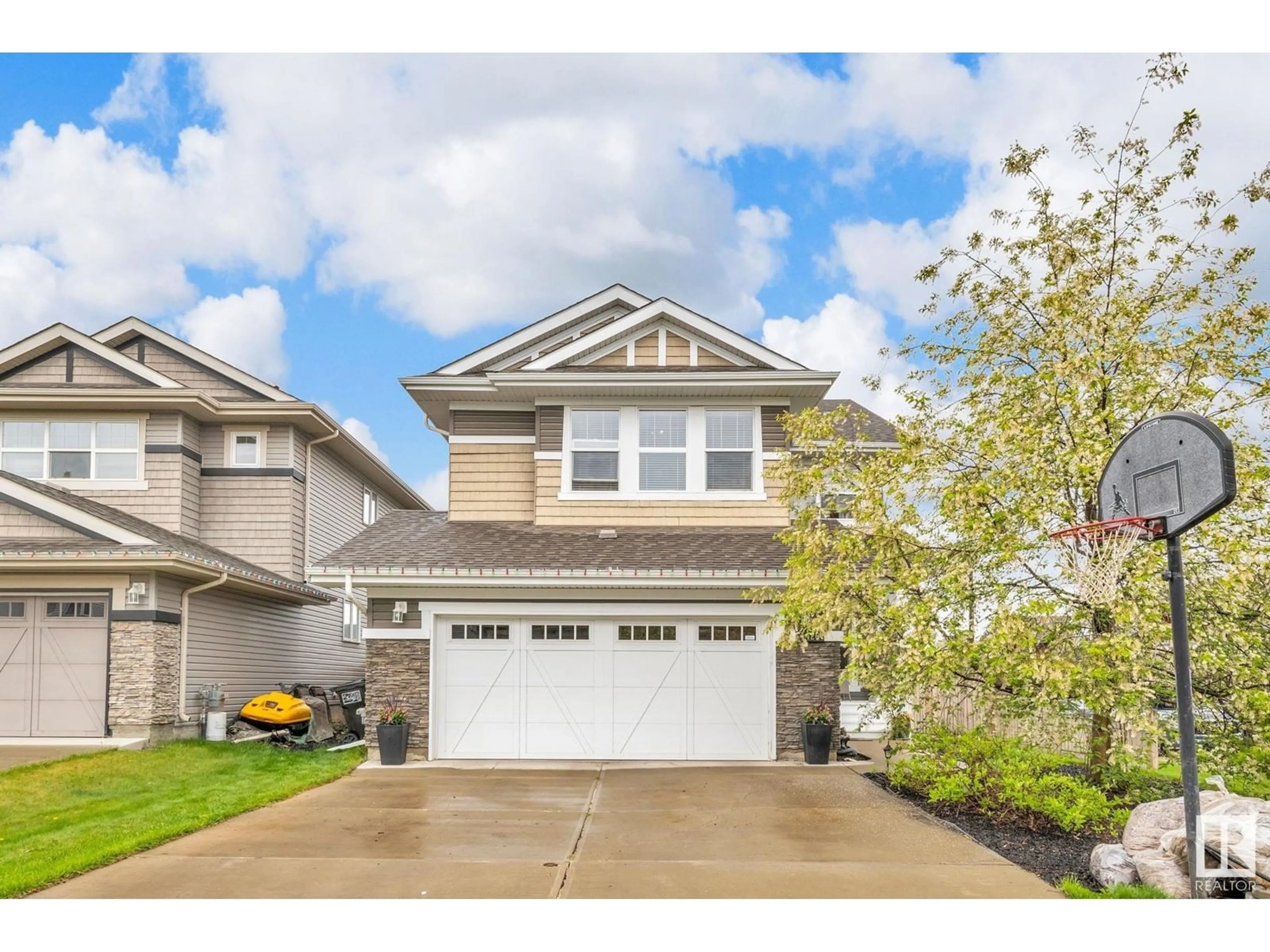 Home with vinyl exterior material, street for 1426 CAREY WY, Edmonton Alberta T6W0Y8