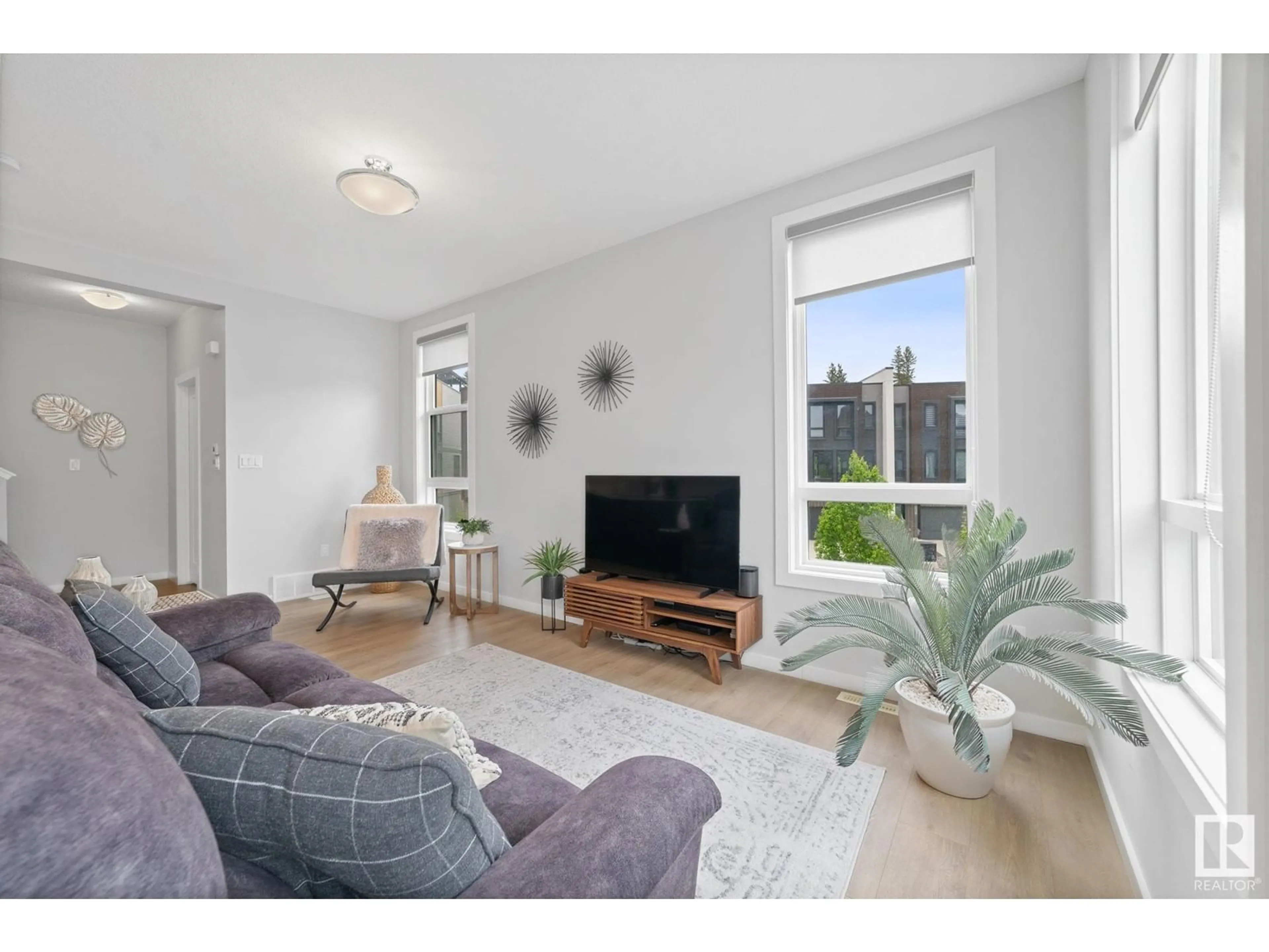 Living room with furniture, unknown for #107 - 1304 RUTHERFORD RD, Edmonton Alberta T6W0B4