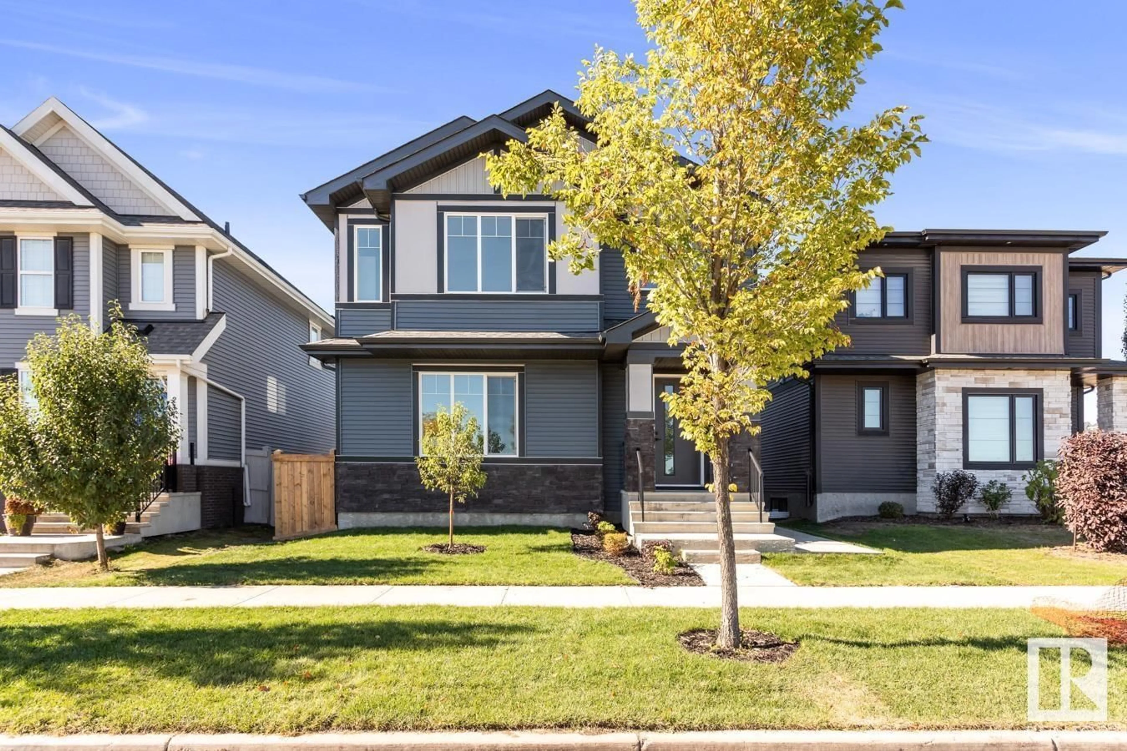 Home with vinyl exterior material, street for 239 GRIESBACH RD, Edmonton Alberta T5E6E5