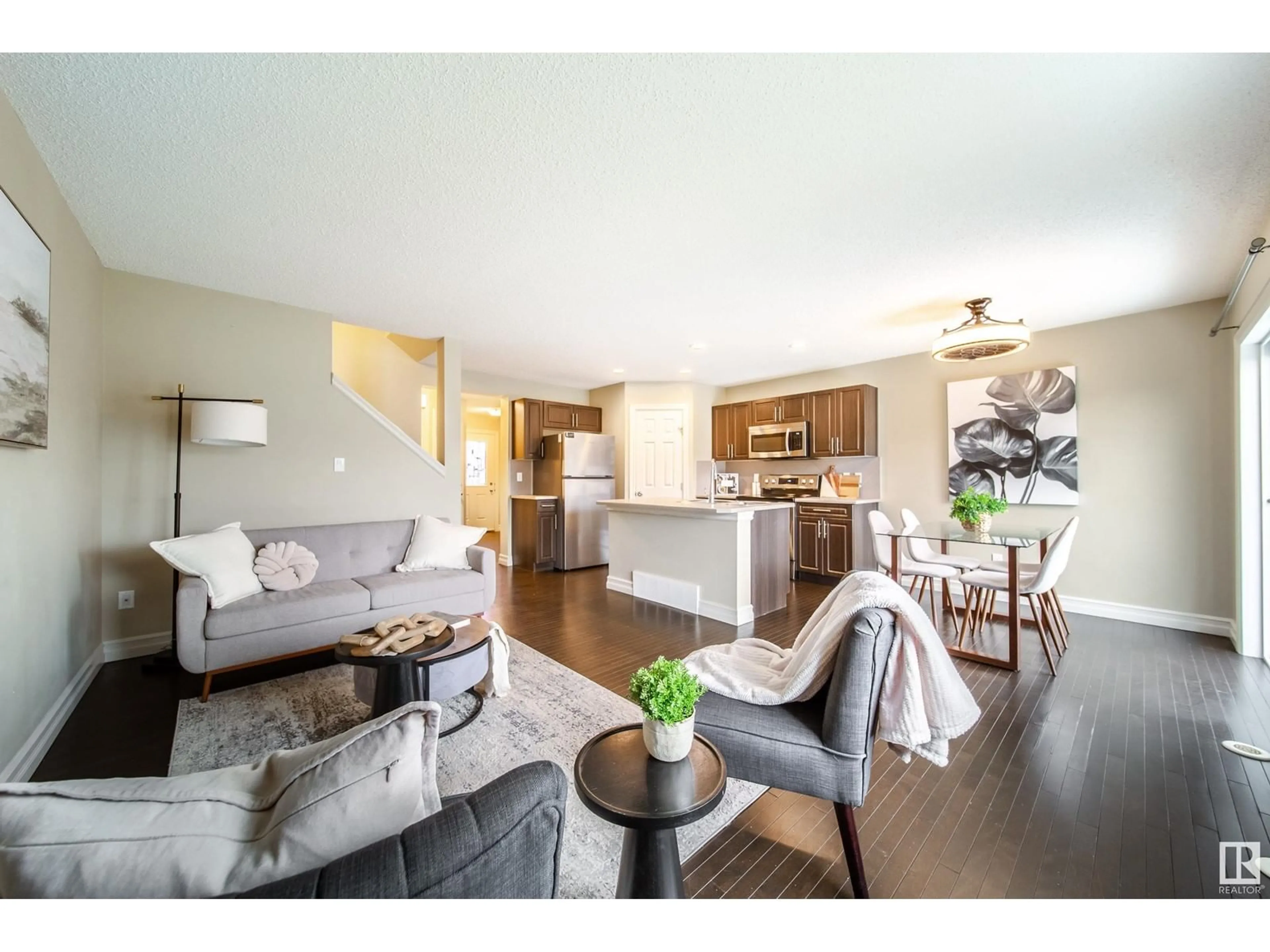 Open concept kitchen, wood/laminate floor for SW - 6855 CARDINAL LINK LI, Edmonton Alberta T6W1Z1