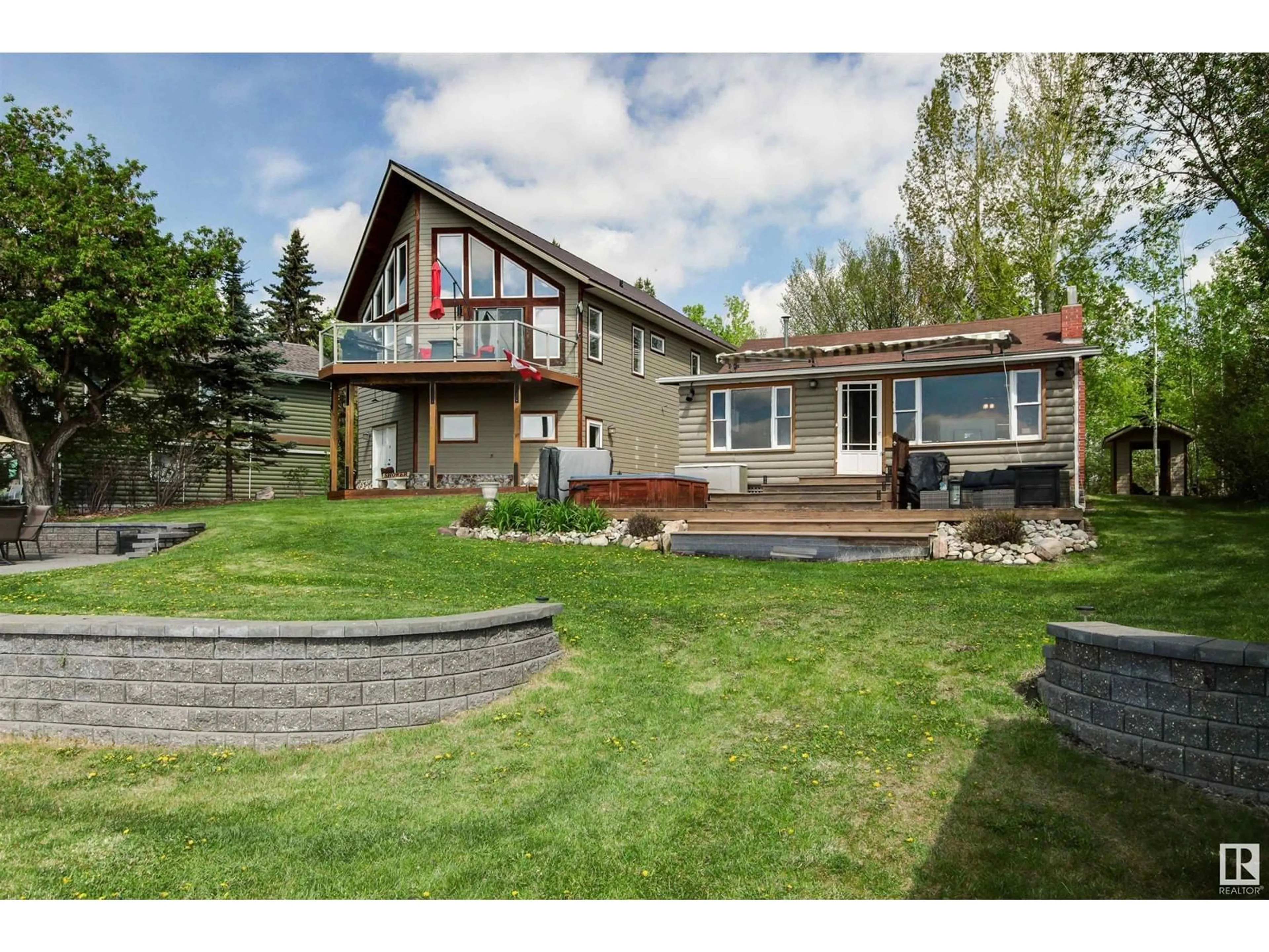 A pic from outside/outdoor area/front of a property/back of a property/a pic from drone, unknown for 32 PROSPECT DRIVE, Rural Parkland County Alberta T0E2K0