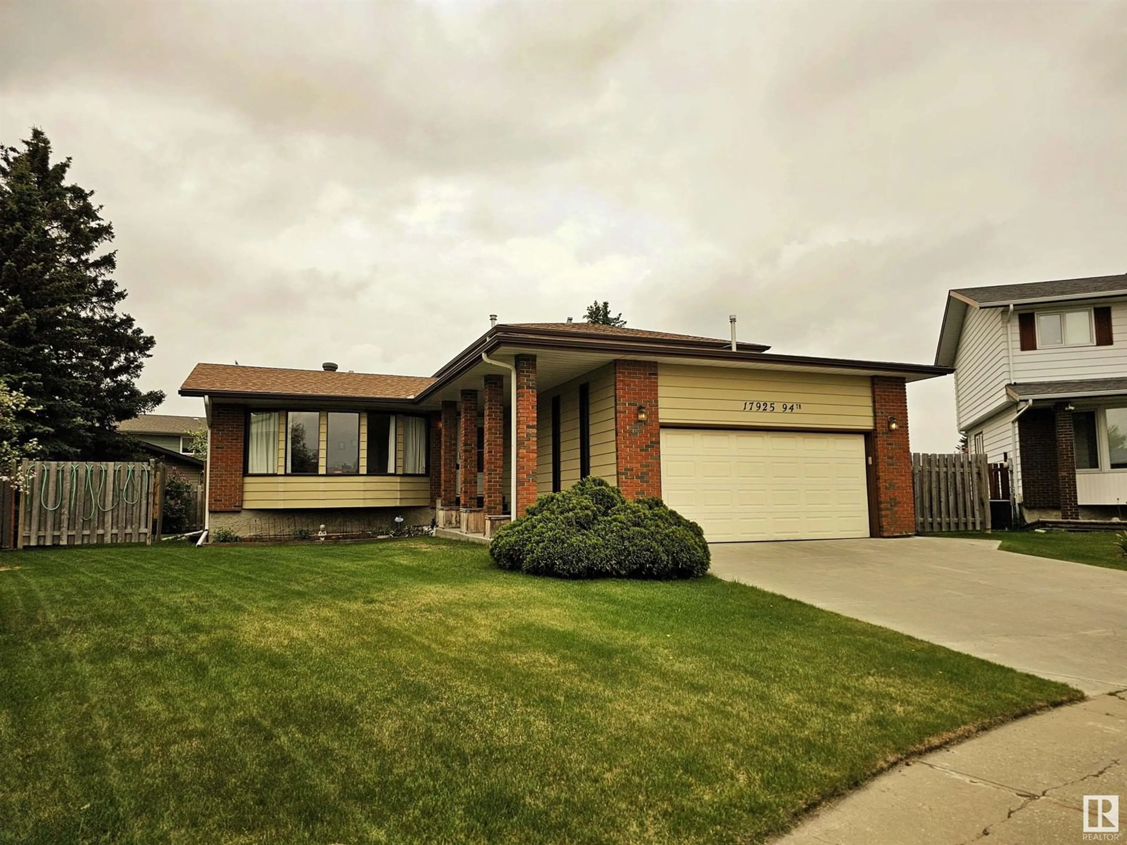 Home with brick exterior material, street for 17925 94 AV, Edmonton Alberta T5T1Y3