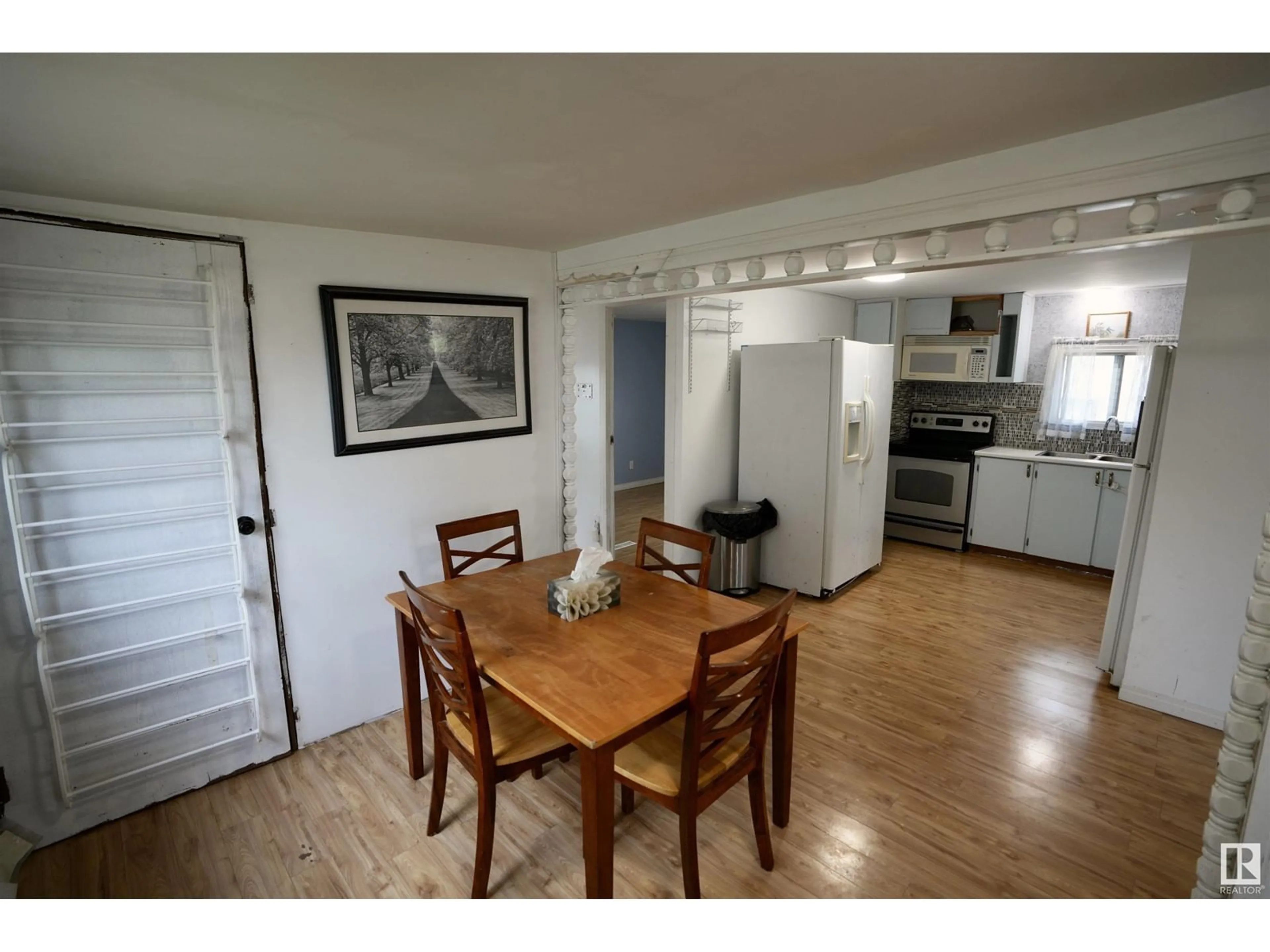 Dining room, wood/laminate floor for 3705 1ST ST, Mallaig Alberta T0A2K0