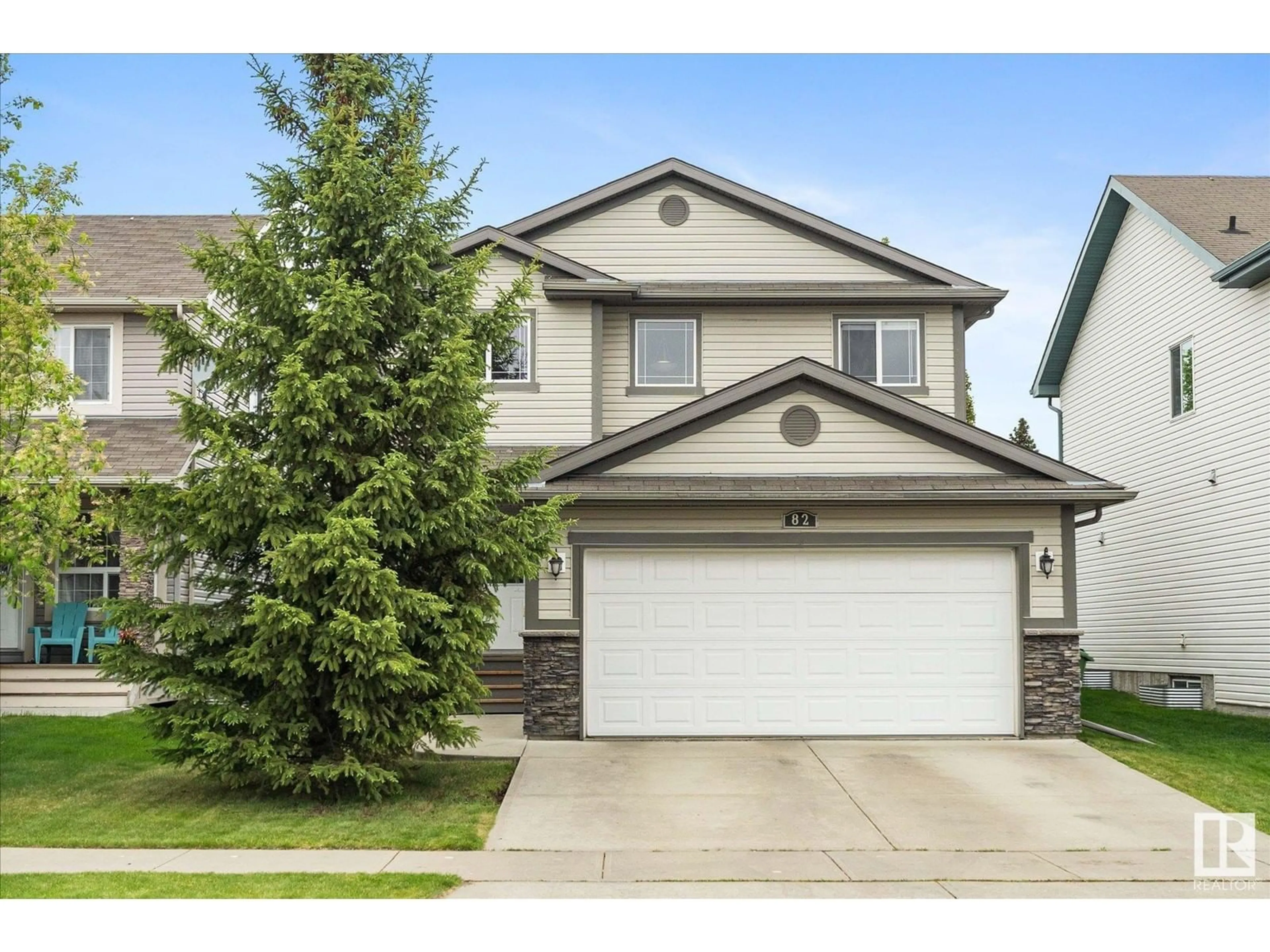 Home with vinyl exterior material, street for 82 SONORA, Fort Saskatchewan Alberta T8L0G1