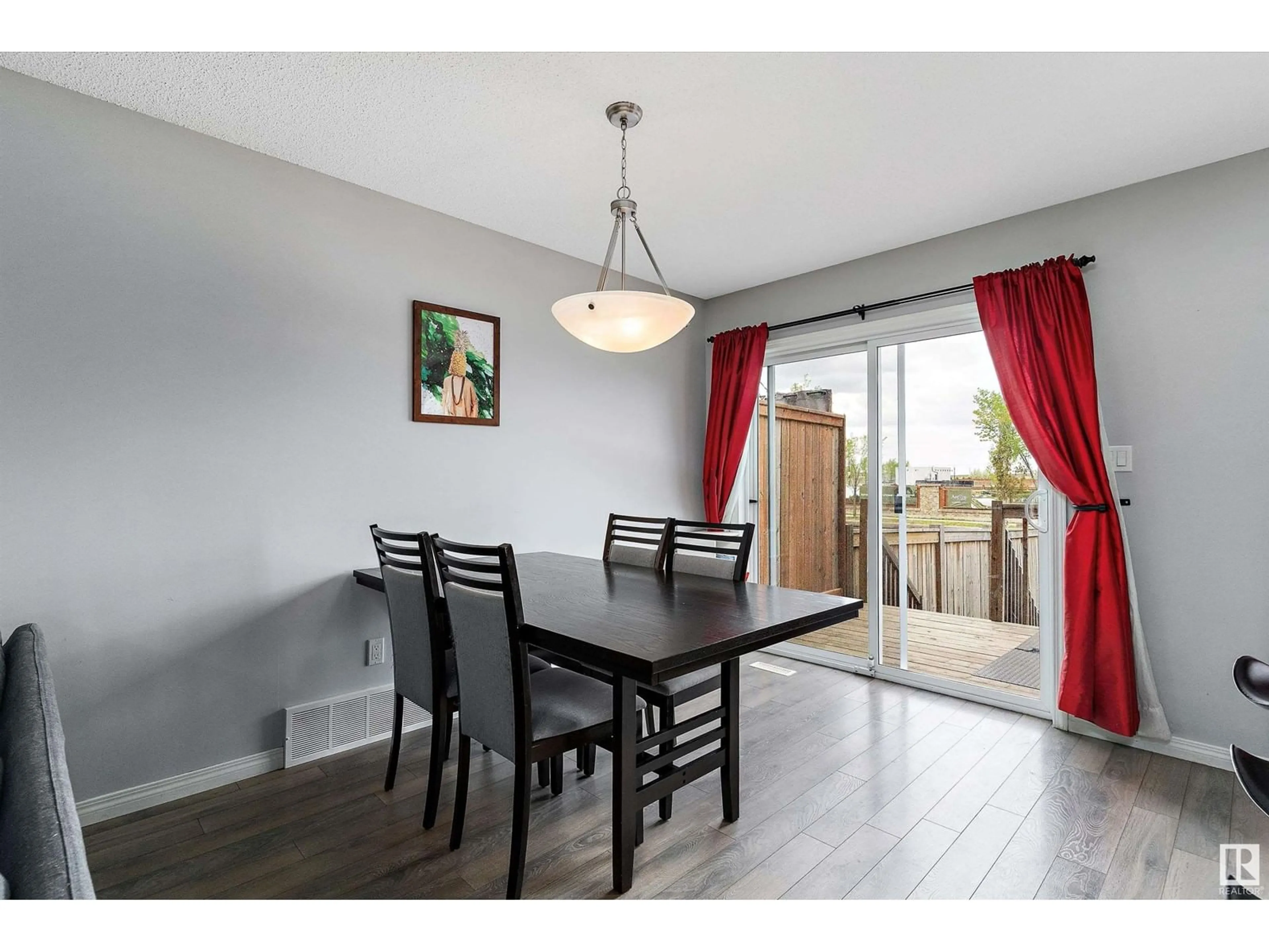 Dining room, wood/laminate floor for 4420 PROWSE RD, Edmonton Alberta T6W3A5