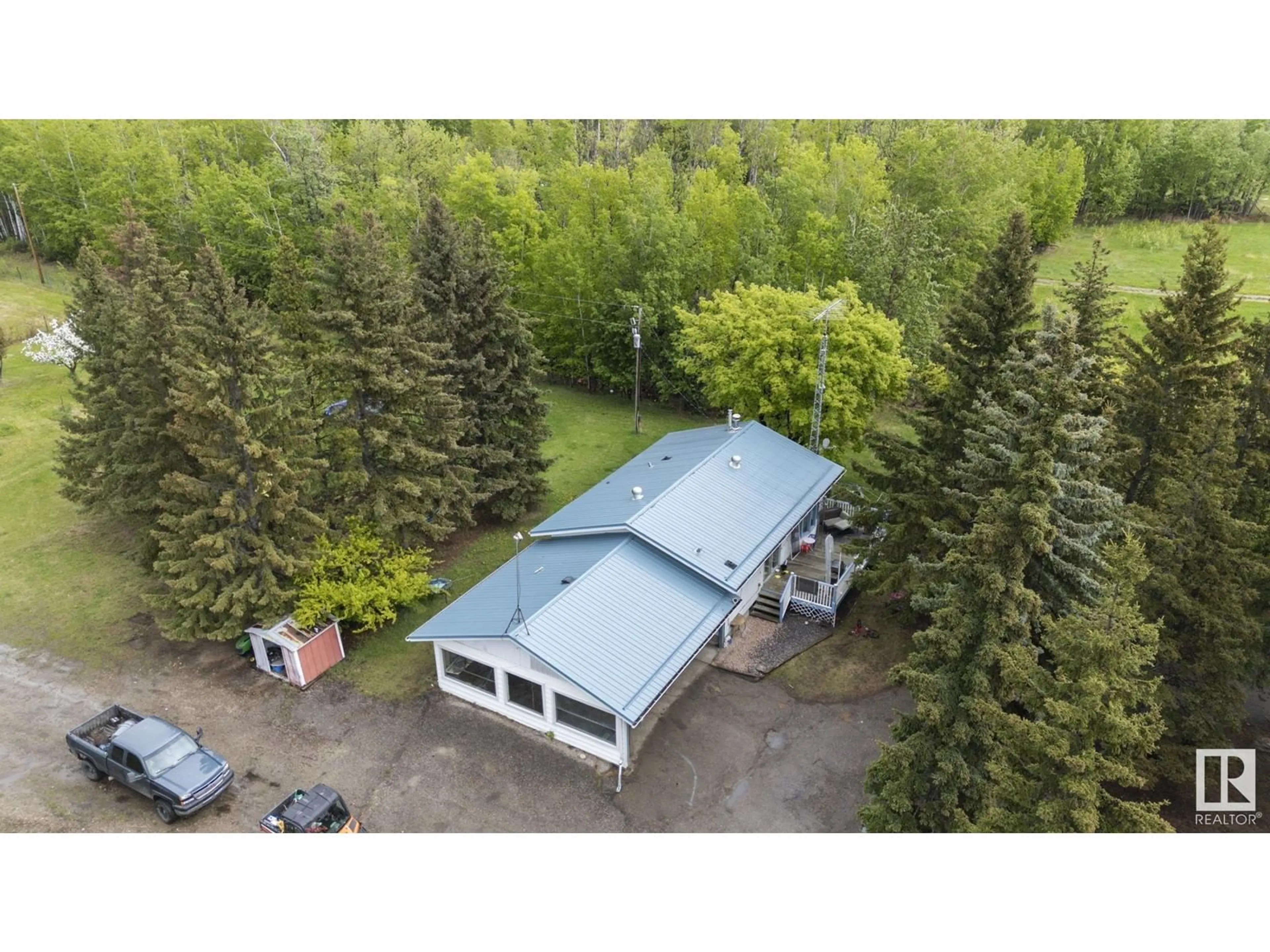 A pic from outside/outdoor area/front of a property/back of a property/a pic from drone, forest/trees view for 5432 HIGHWAY 16, Rural Parkland County Alberta T0E0W0