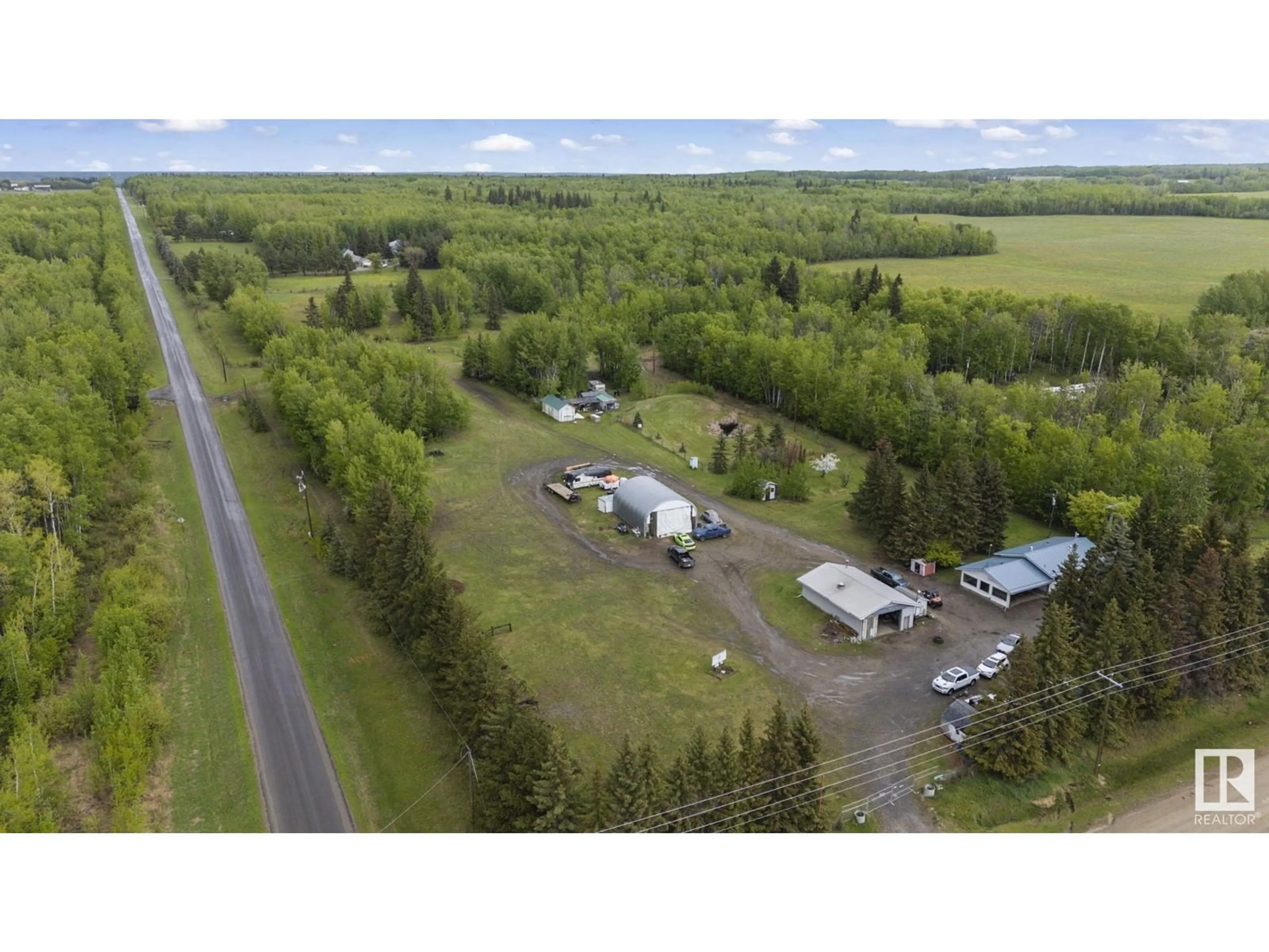 A pic from outside/outdoor area/front of a property/back of a property/a pic from drone, unknown for 5432 HIGHWAY 16, Rural Parkland County Alberta T0E0W0