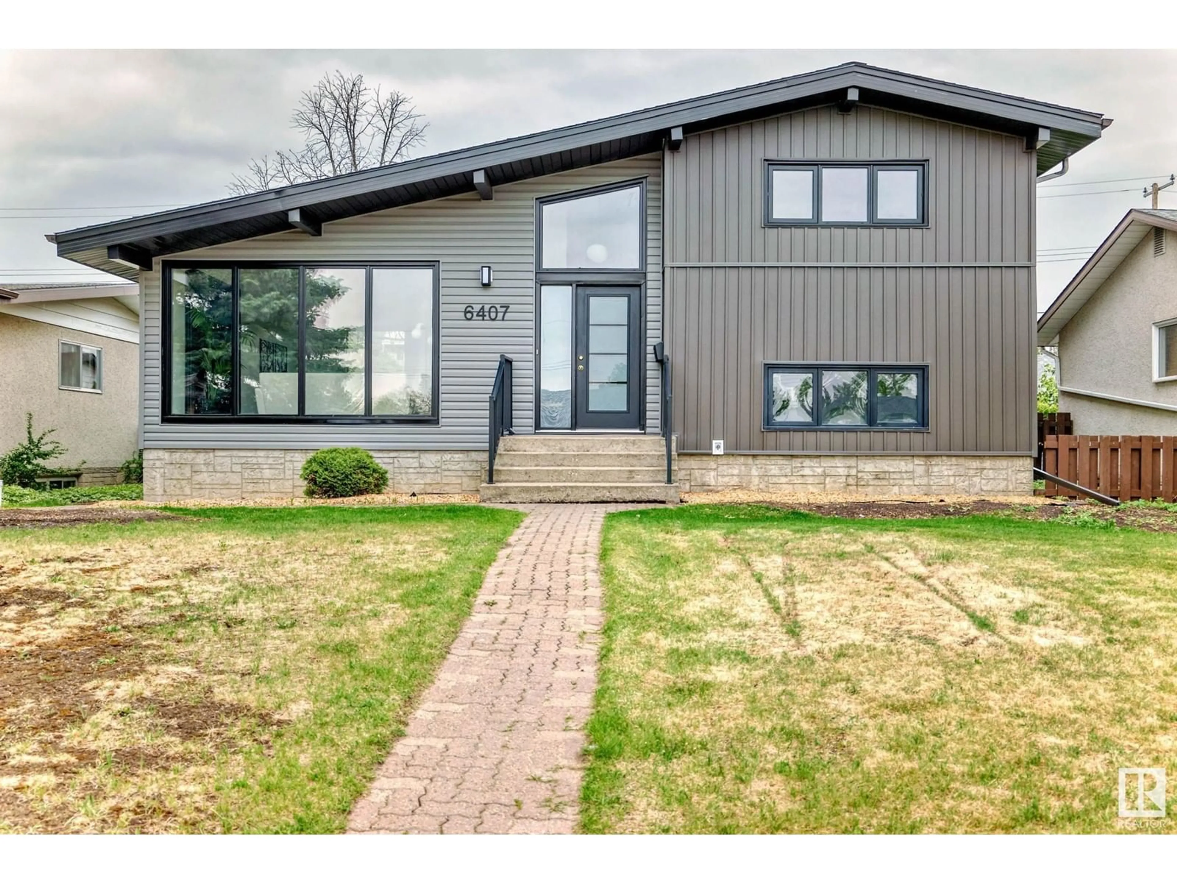 Home with brick exterior material, unknown for 6407 92A AV, Edmonton Alberta T6B0T5