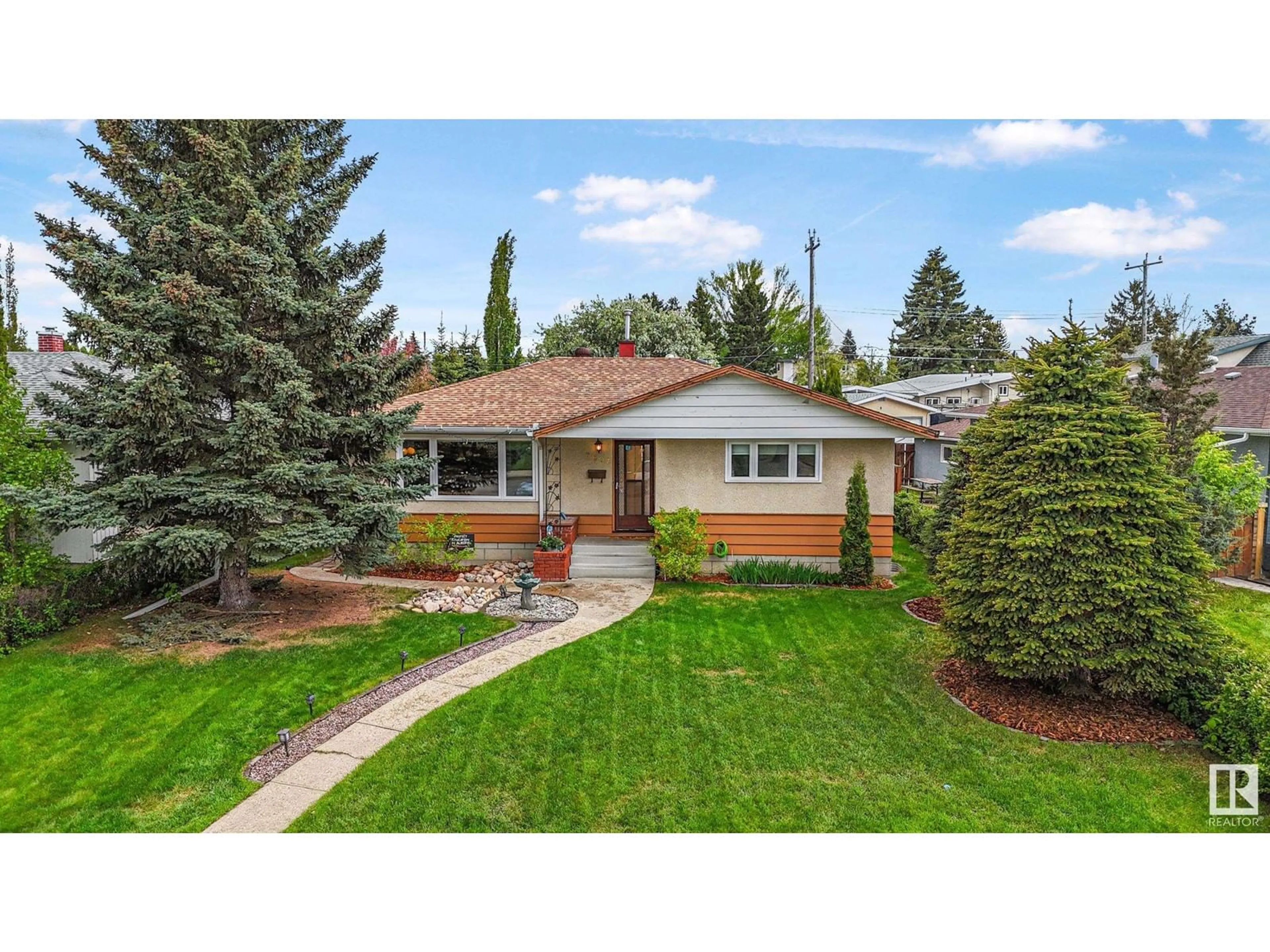 Home with brick exterior material, street for 6607 89 AV, Edmonton Alberta T6B0N1