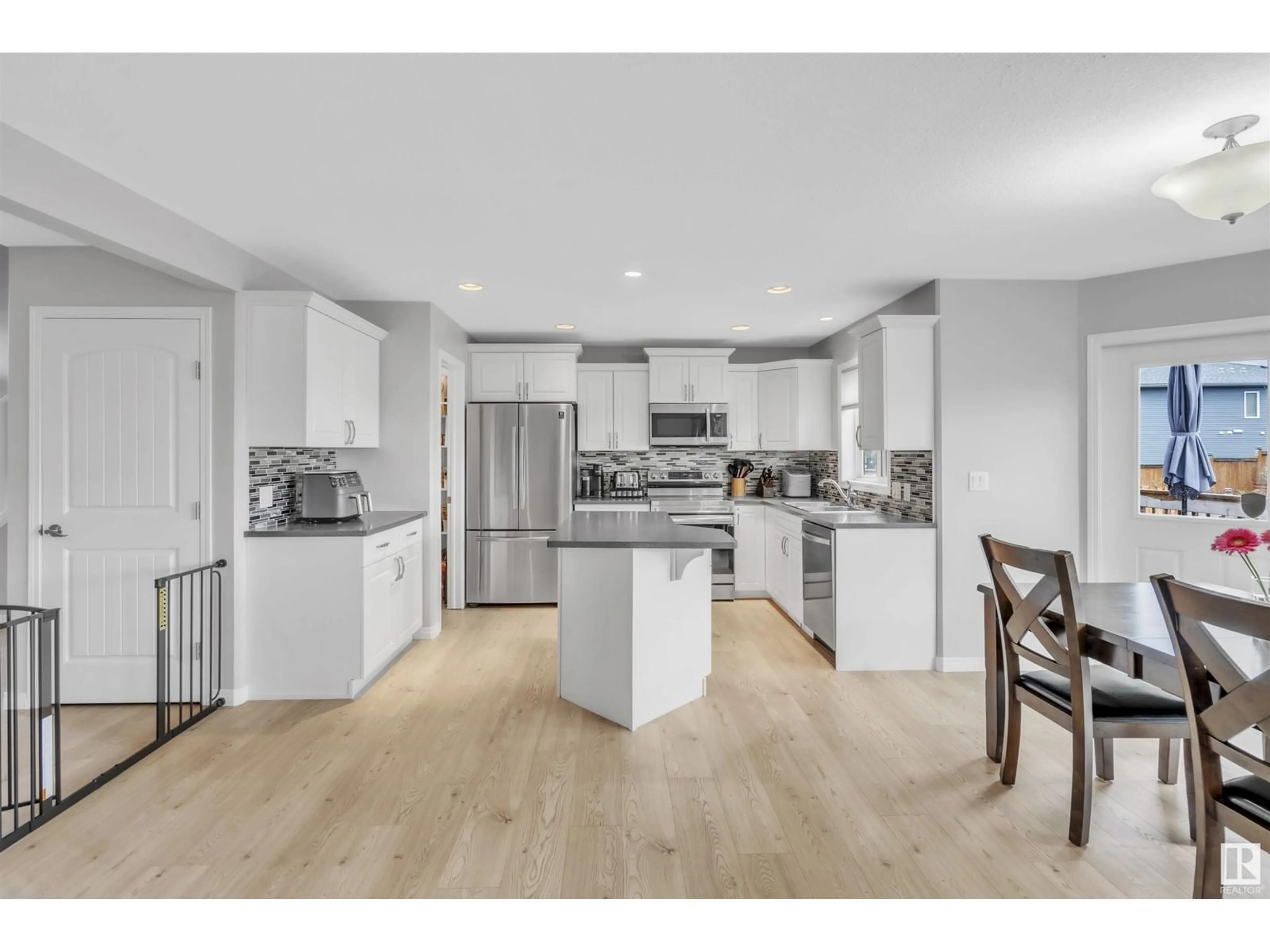 Open concept kitchen, wood/laminate floor for 4507 65 AV, Cold Lake Alberta T9M0J2