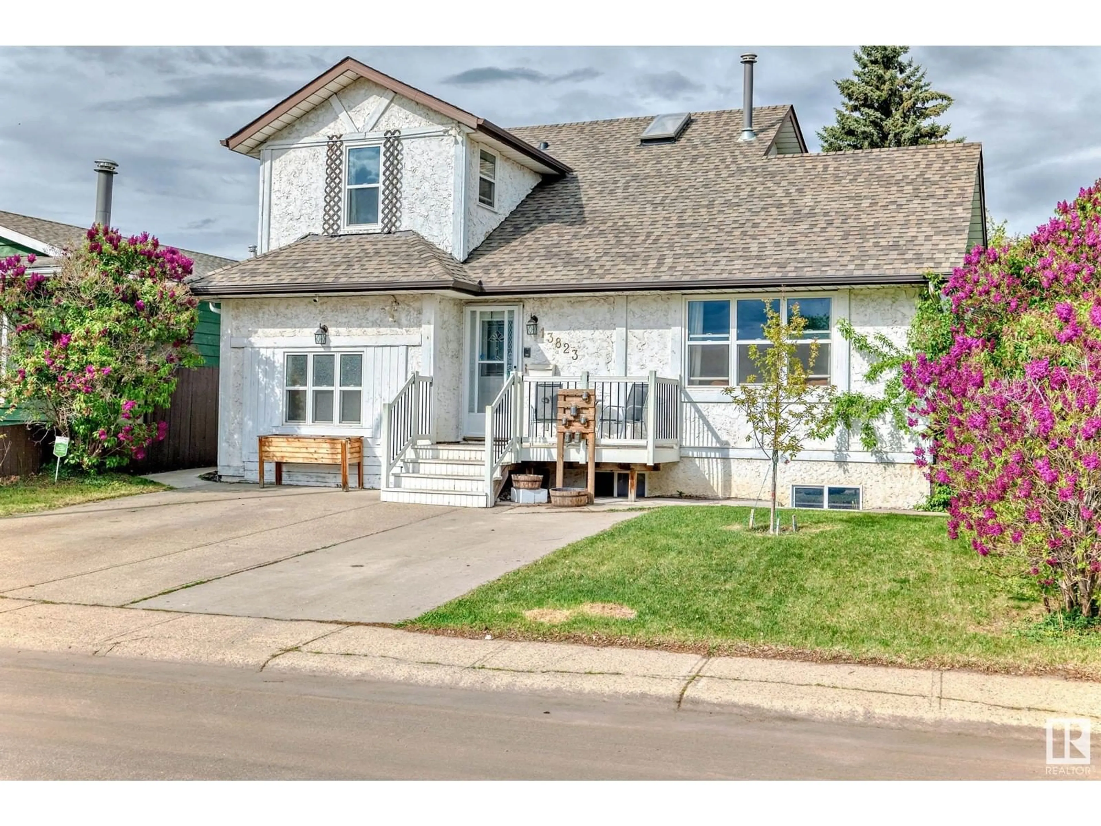 Home with vinyl exterior material, street for NW - 13823 23 ST, Edmonton Alberta T5Y1C1