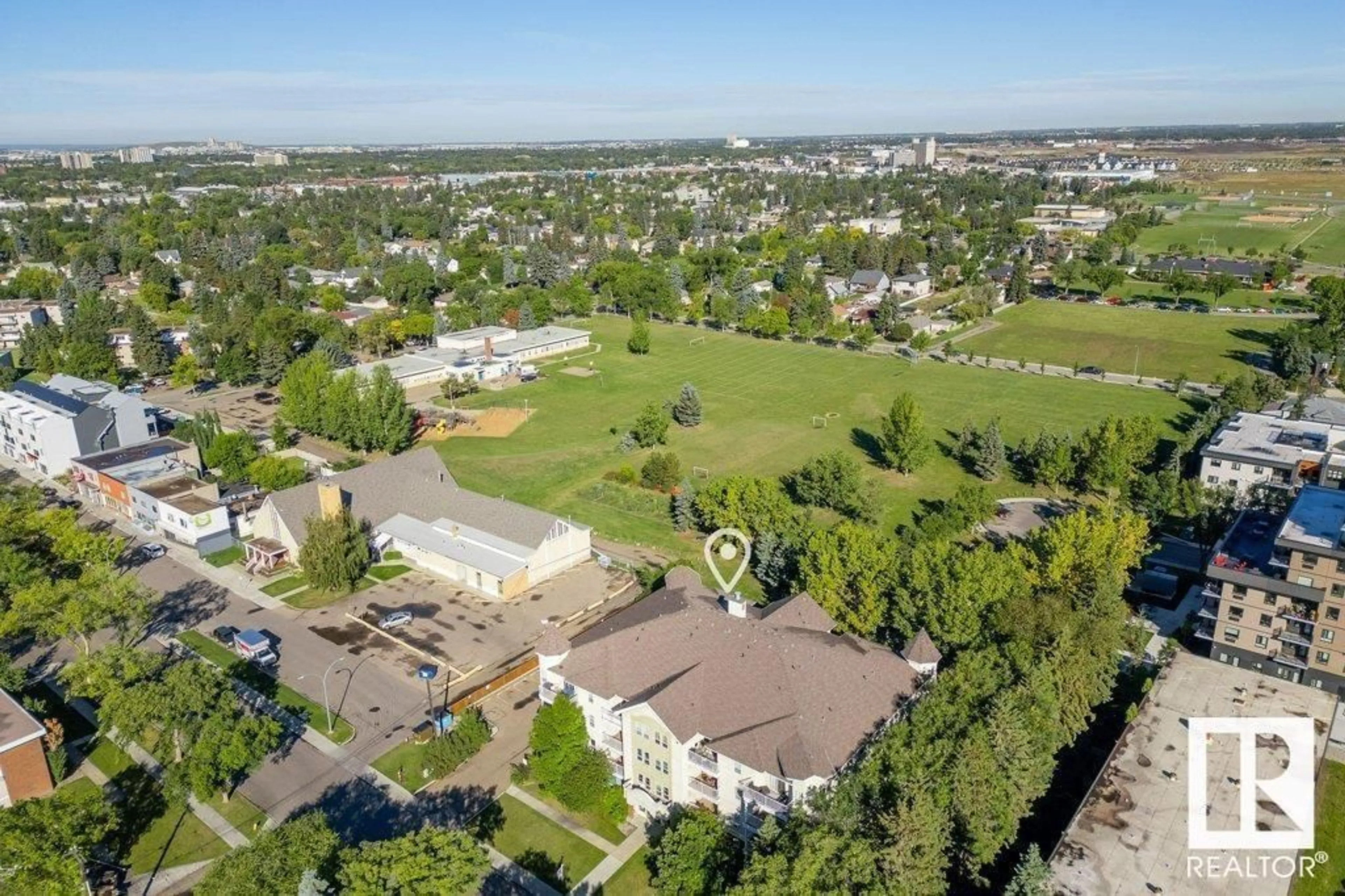 A pic from outside/outdoor area/front of a property/back of a property/a pic from drone, mountain view for 402 - 11104 109 AV NW, Edmonton Alberta T5H1E1