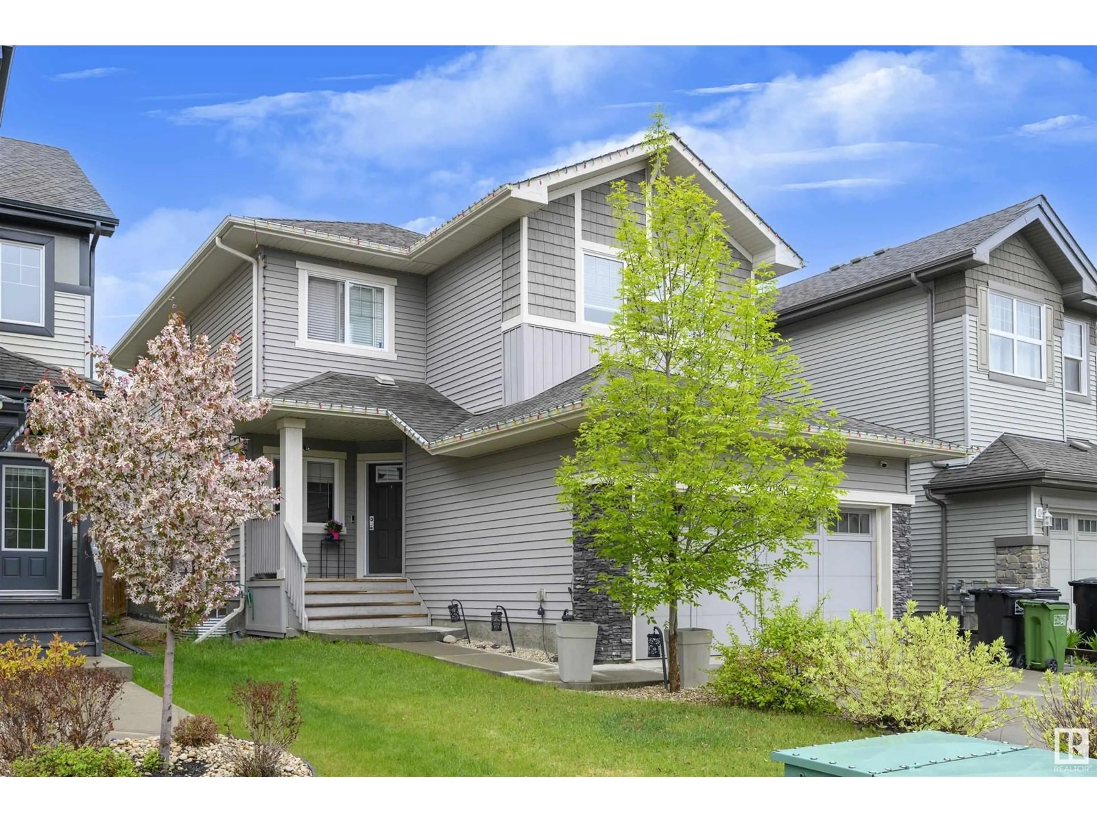 Home with vinyl exterior material, street for 7298 EDGEMONT WY, Edmonton Alberta T6M2N5