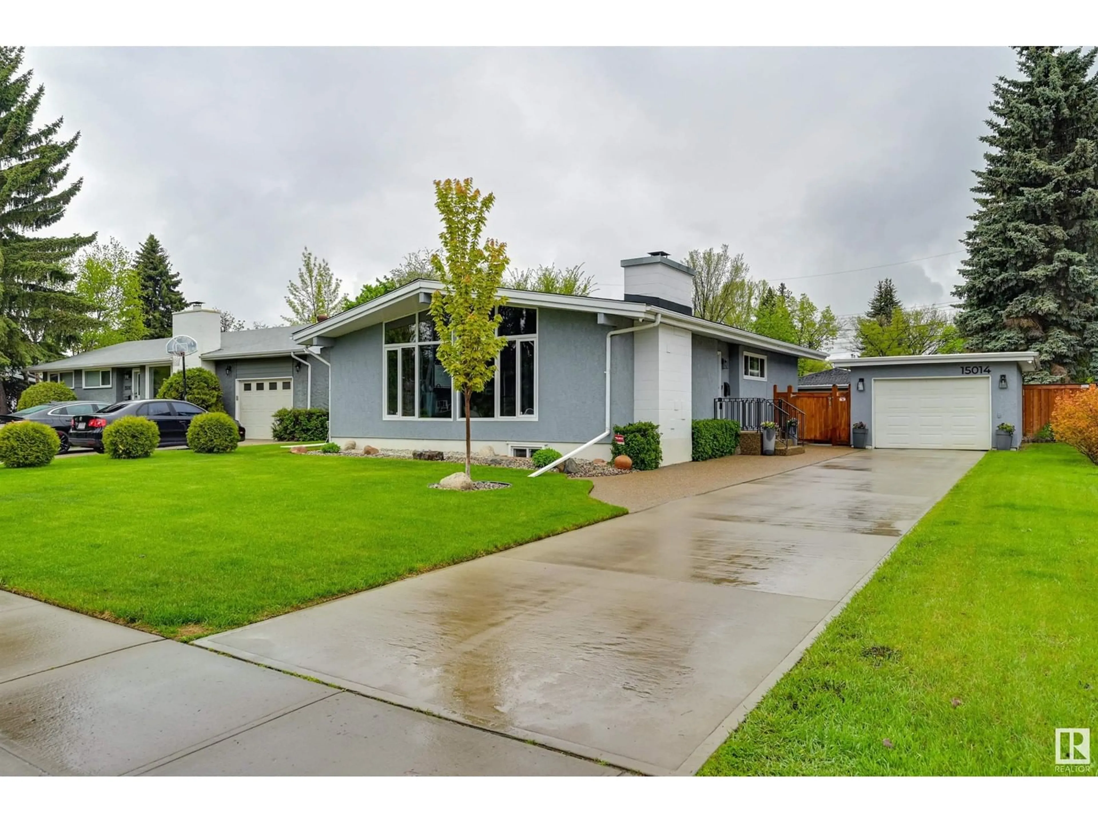 Home with vinyl exterior material, street for 15014 75 AV, Edmonton Alberta T5R2Y7