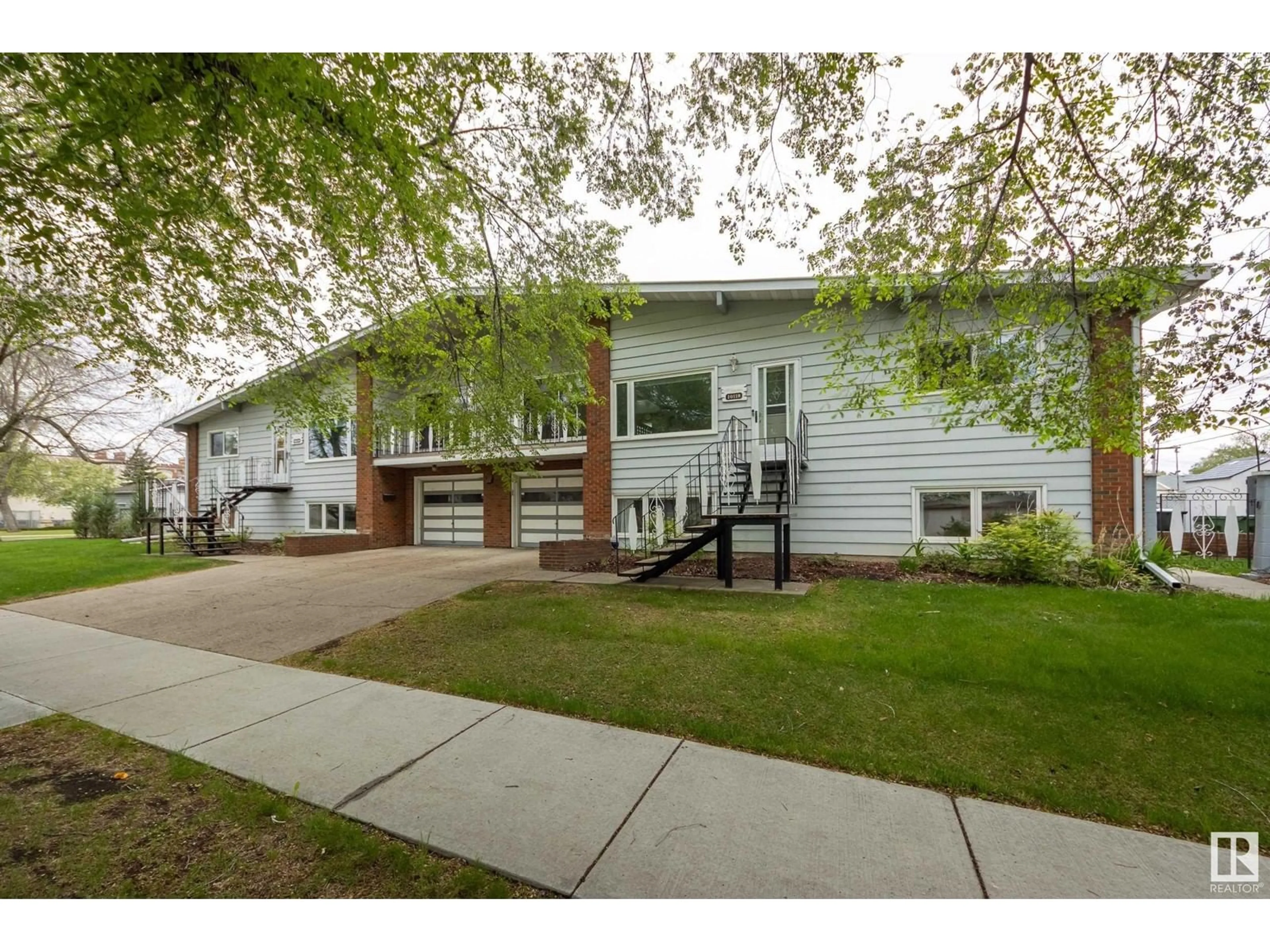 Home with brick exterior material, street for NW - 10118 & 10120 121 AV, Edmonton Alberta T5G3A8