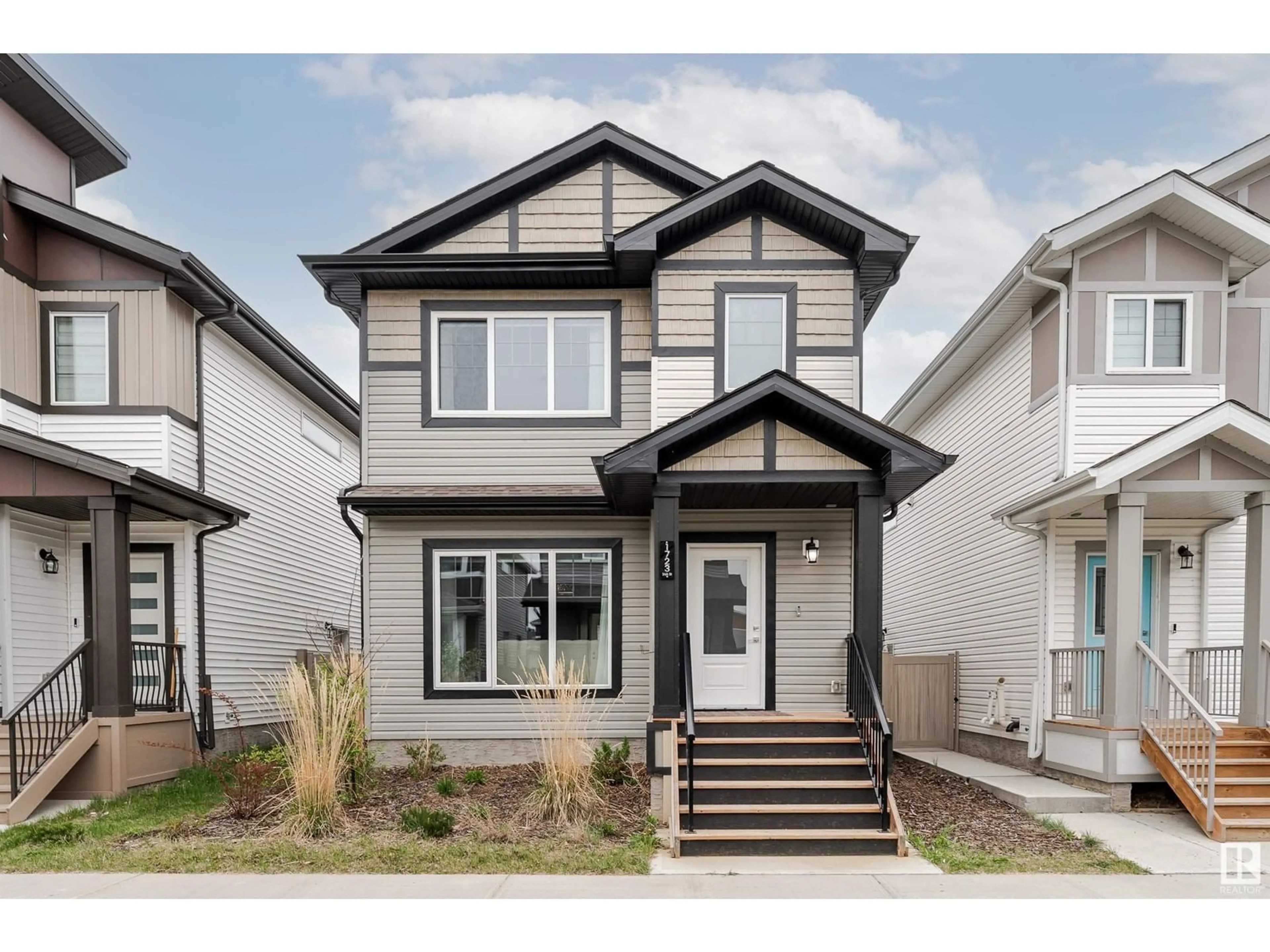 Home with vinyl exterior material, street for NW - 1723 26A ST, Edmonton Alberta T6T2H9