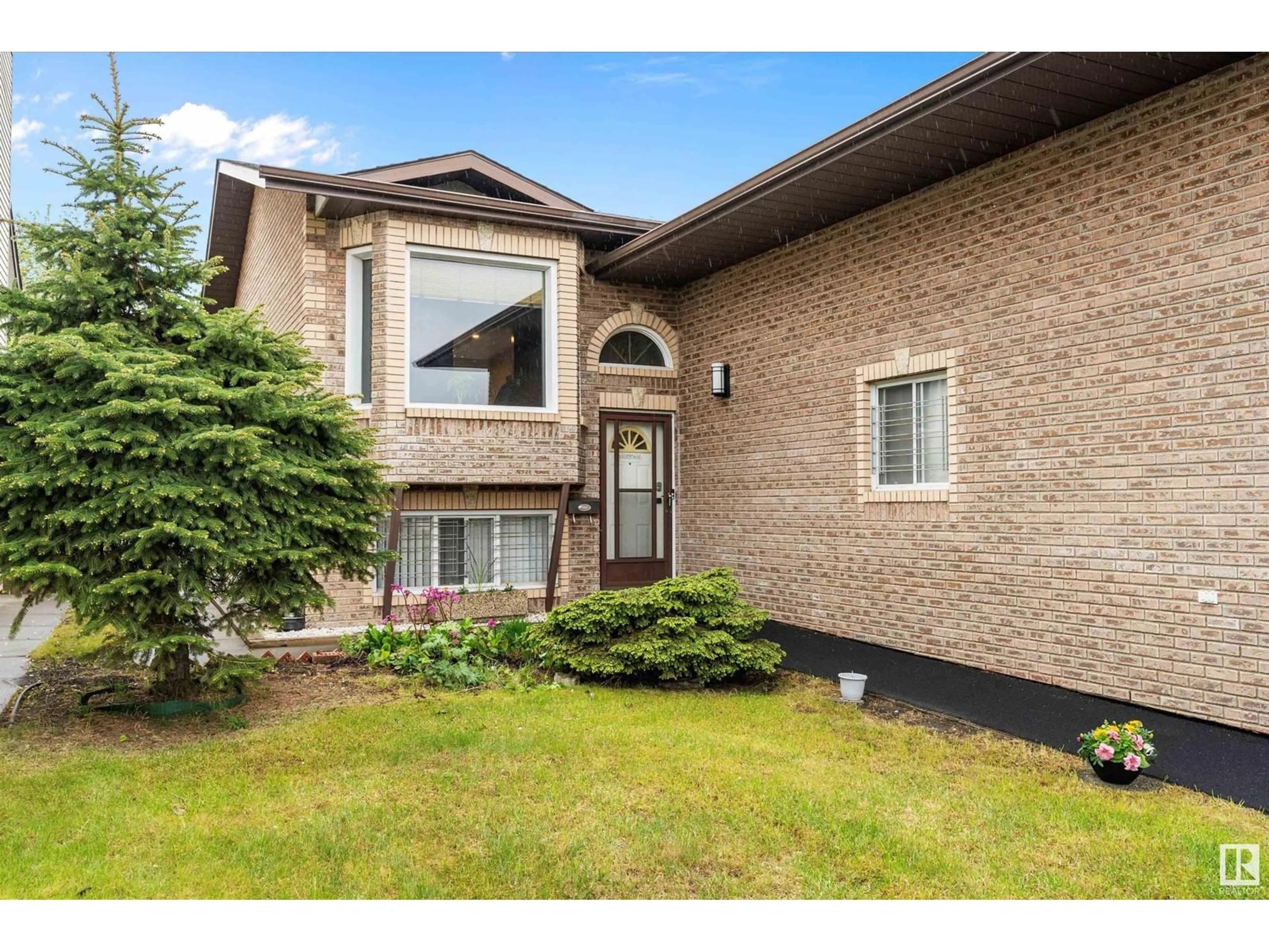 Home with brick exterior material, street for 7259 152C AV, Edmonton Alberta T5C3L9