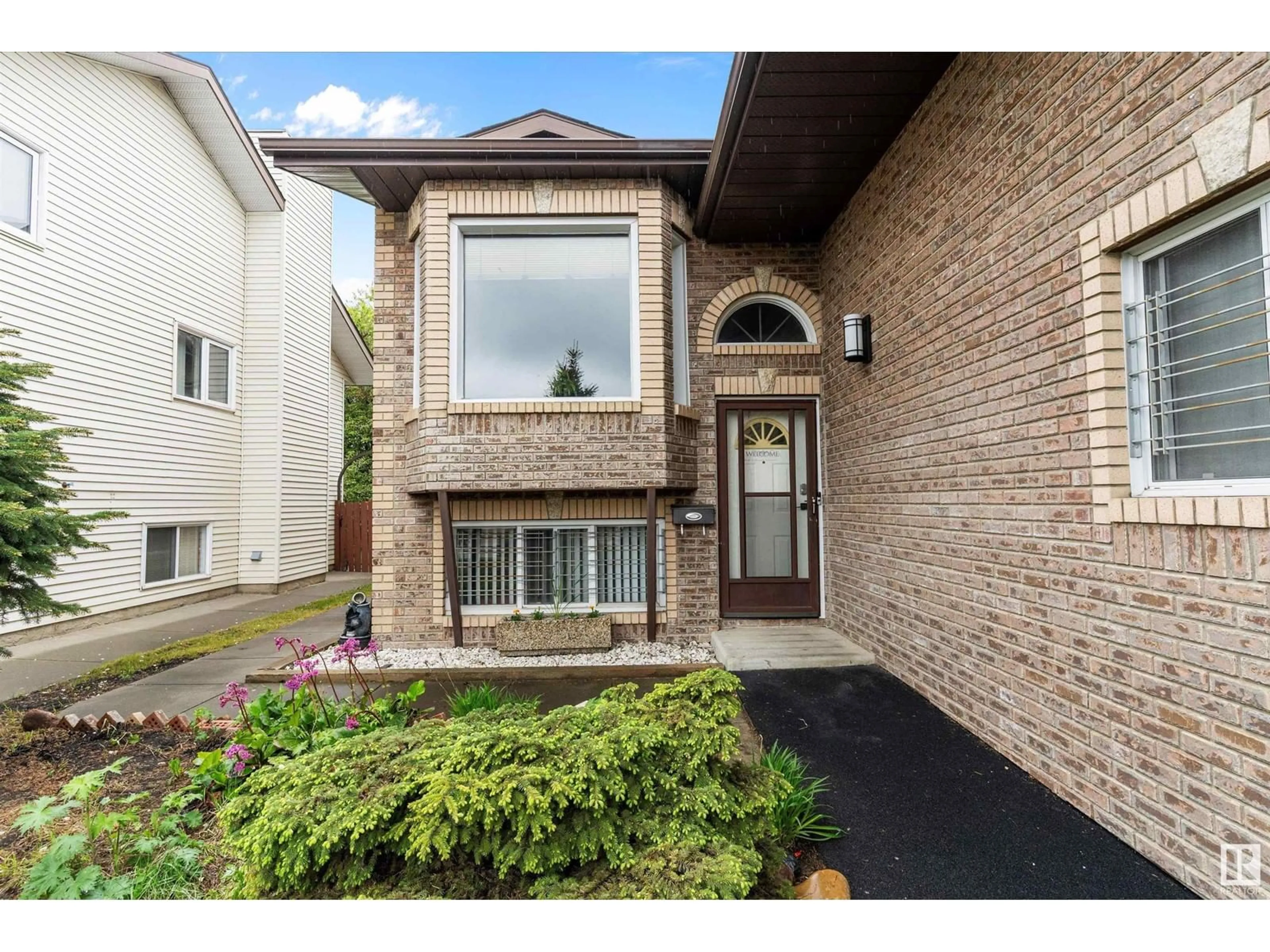 Home with brick exterior material, street for 7259 152C AV, Edmonton Alberta T5C3L9
