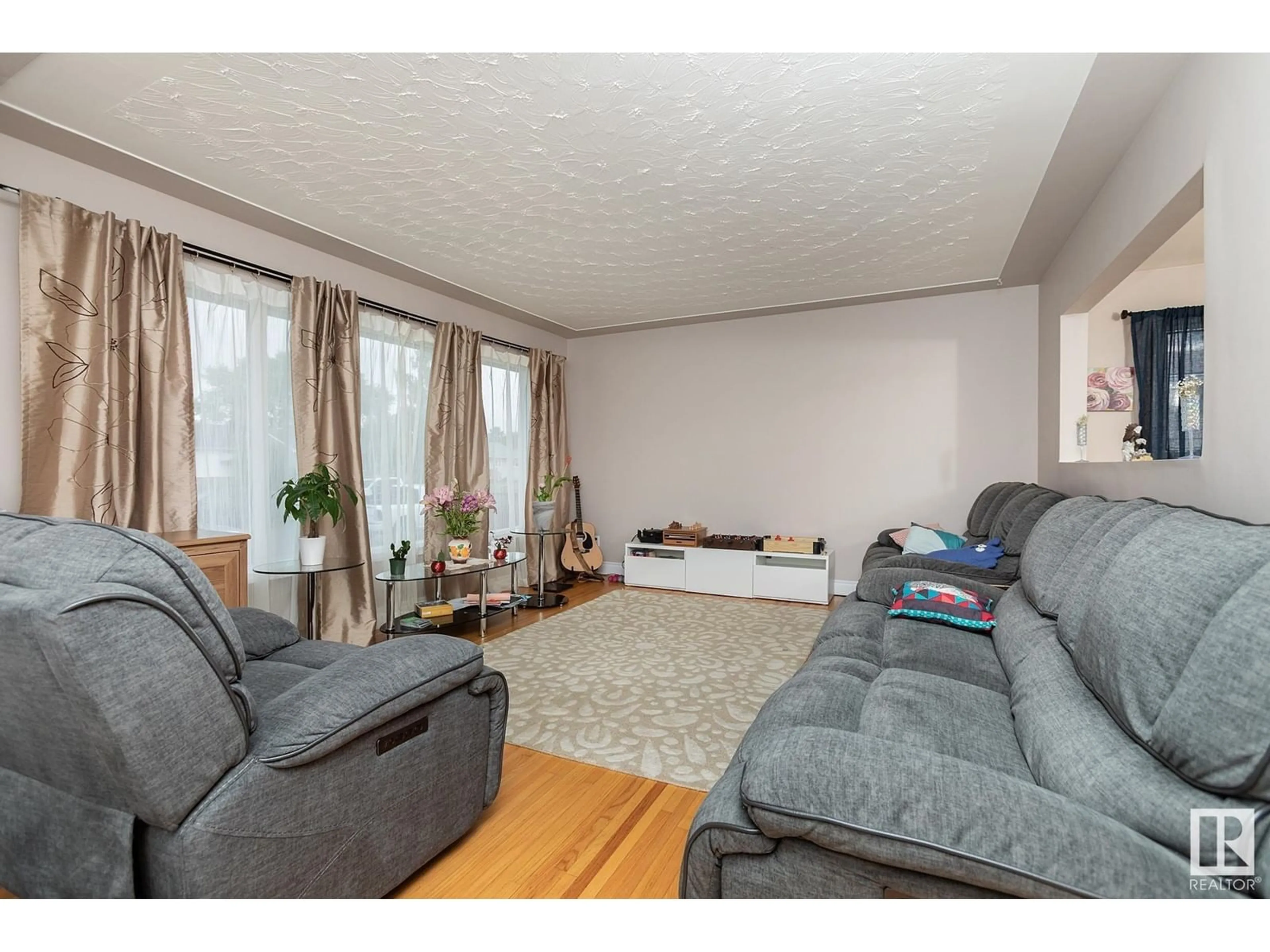 Living room with furniture, unknown for 13519 108 ST, Edmonton Alberta T5E4X7
