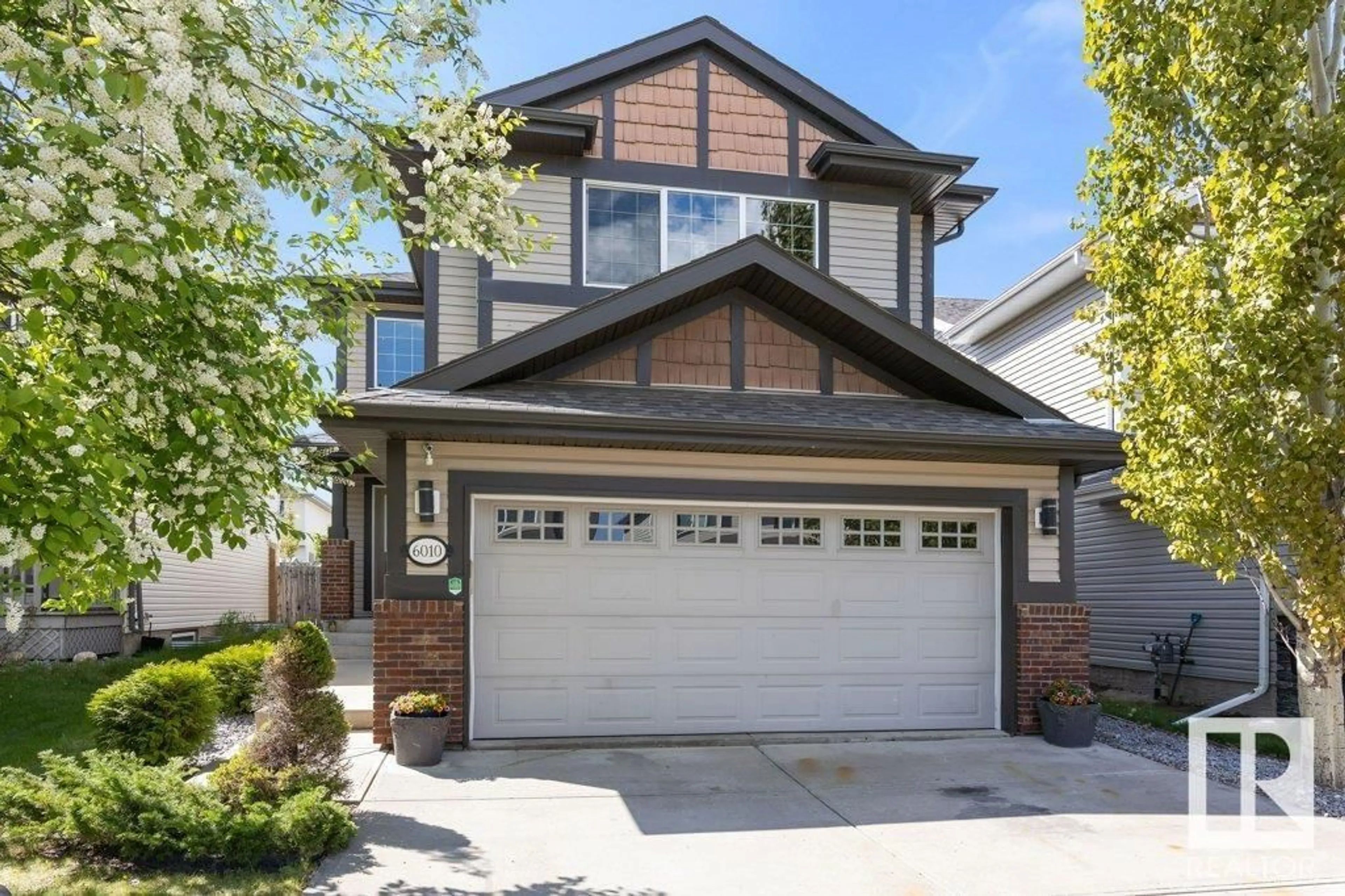 Home with brick exterior material, street for NW - 6010 207A ST, Edmonton Alberta T6M0L6