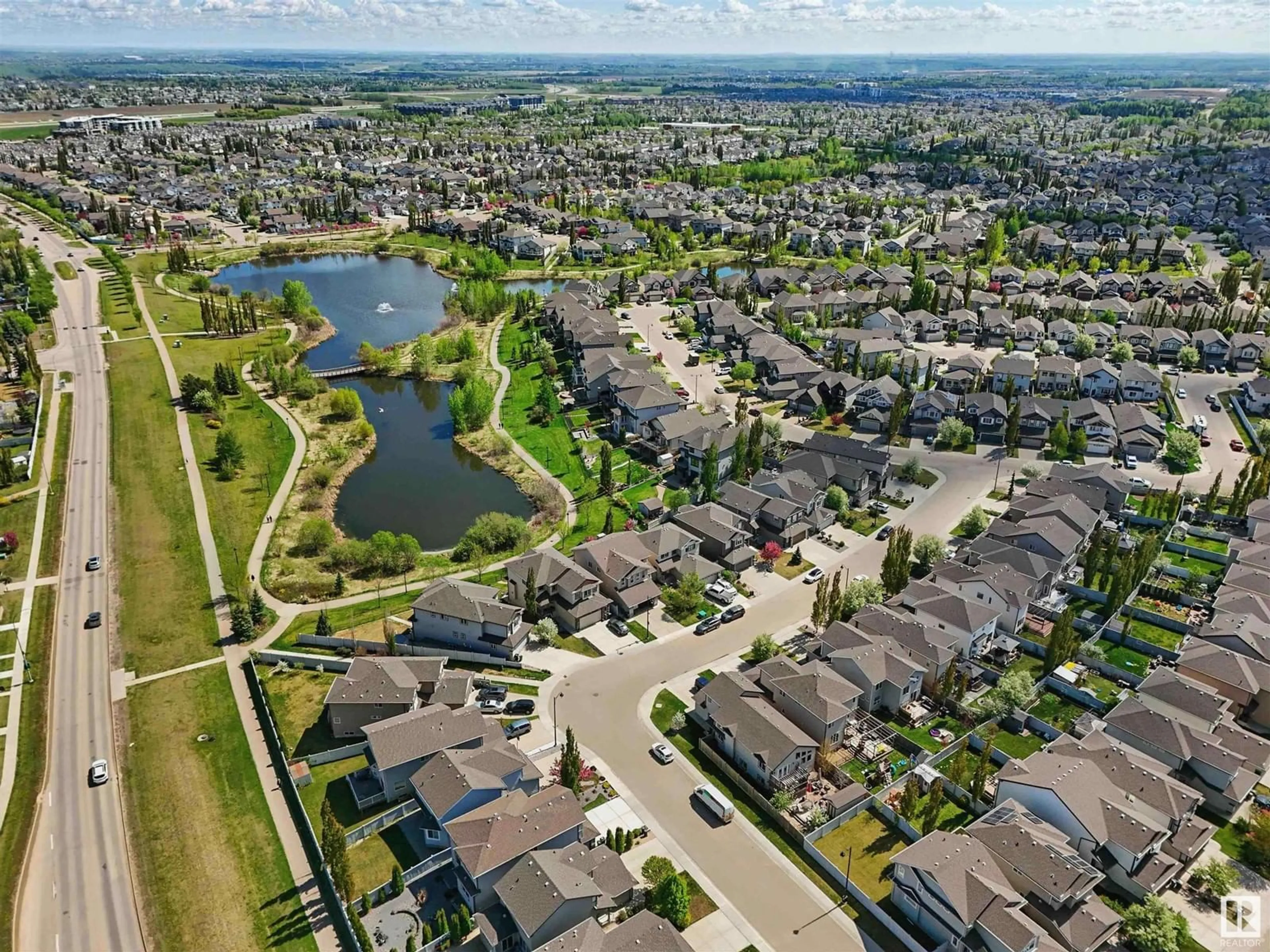 A pic from outside/outdoor area/front of a property/back of a property/a pic from drone, water/lake/river/ocean view for NW - 6010 207A ST, Edmonton Alberta T6M0L6