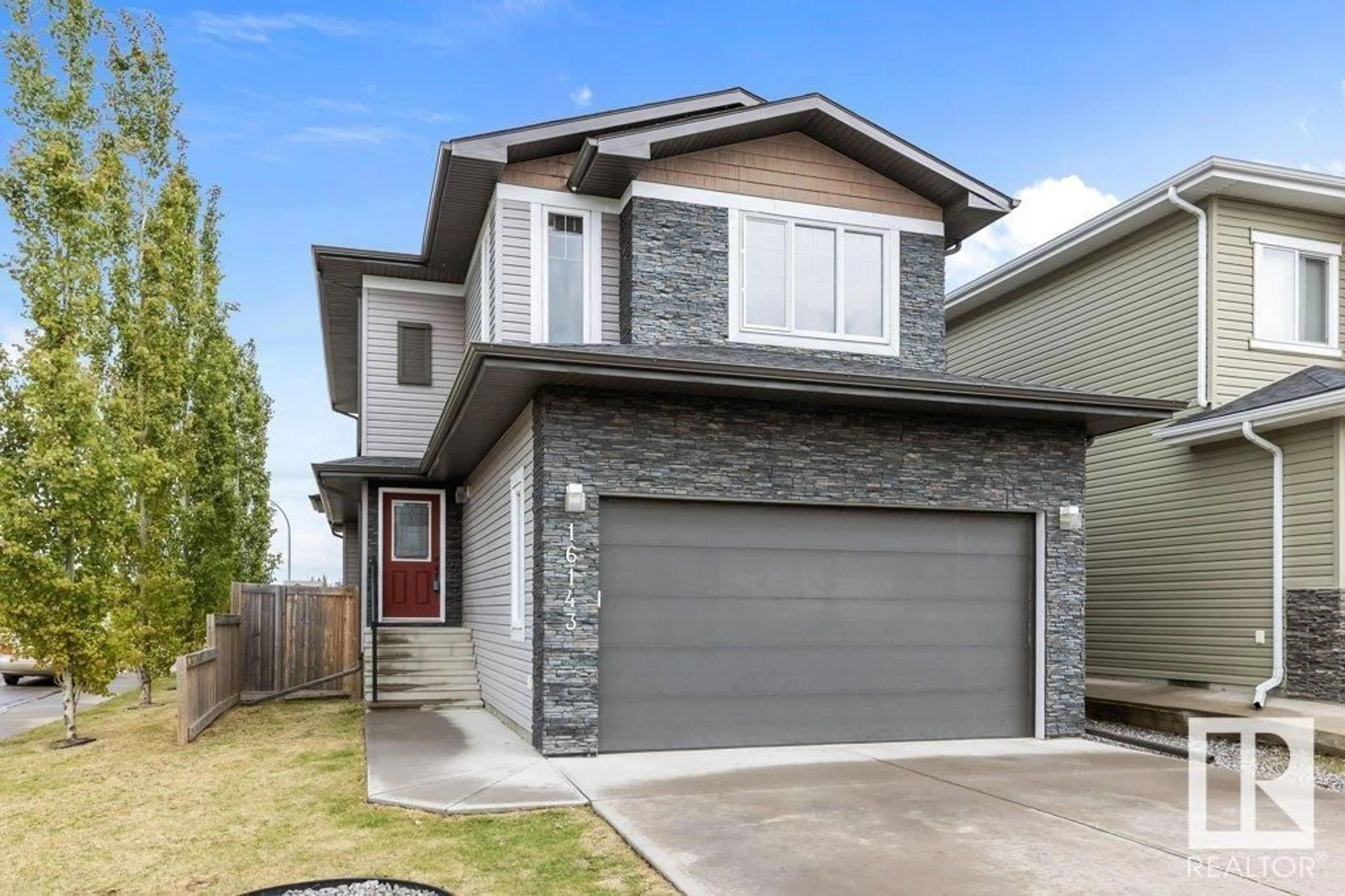 Home with vinyl exterior material, street for NW - 16143 141 ST, Edmonton Alberta T6V0J3