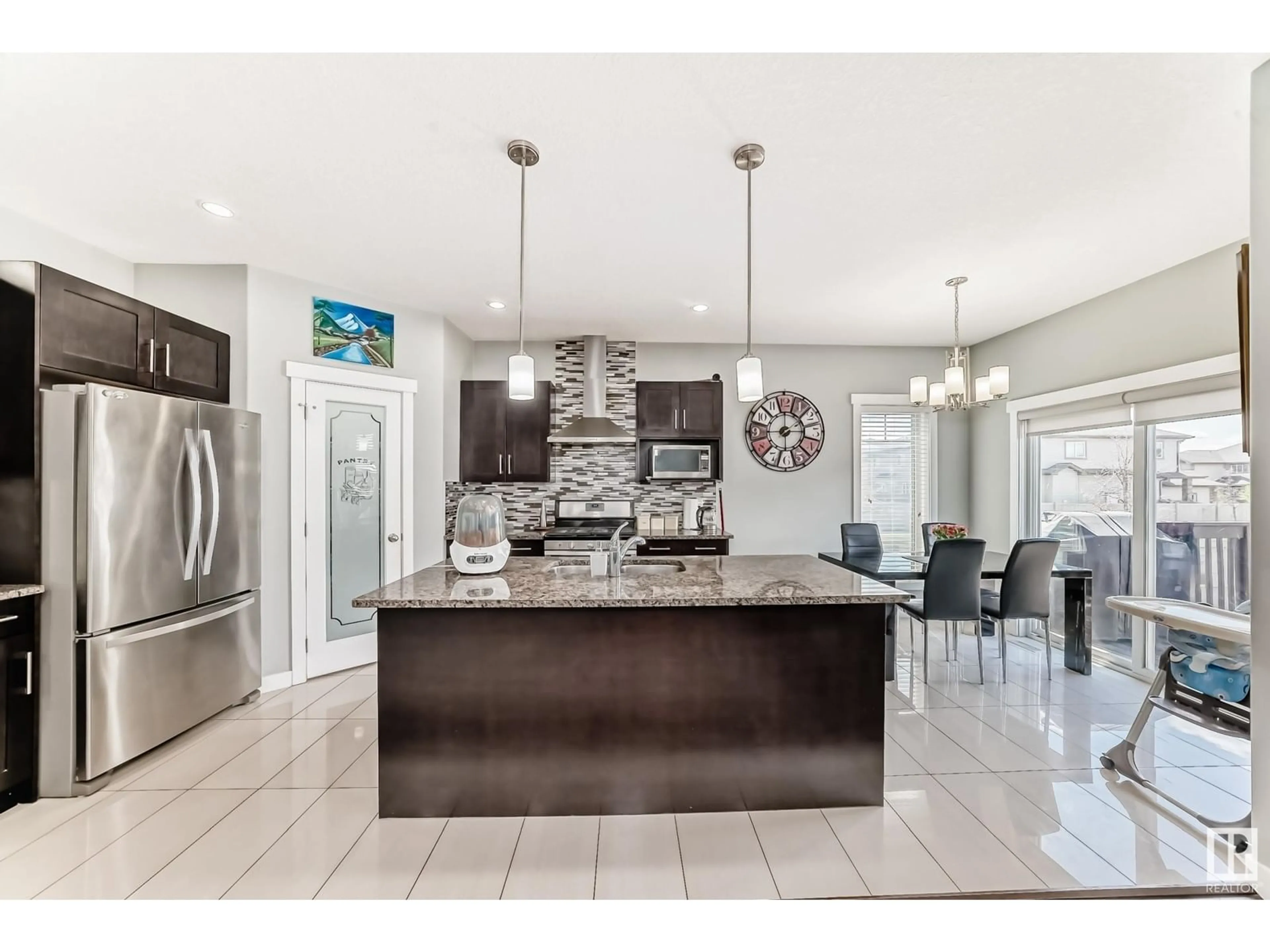 Open concept kitchen, ceramic/tile floor for NW - 16504 132 ST, Edmonton Alberta T6V0J5