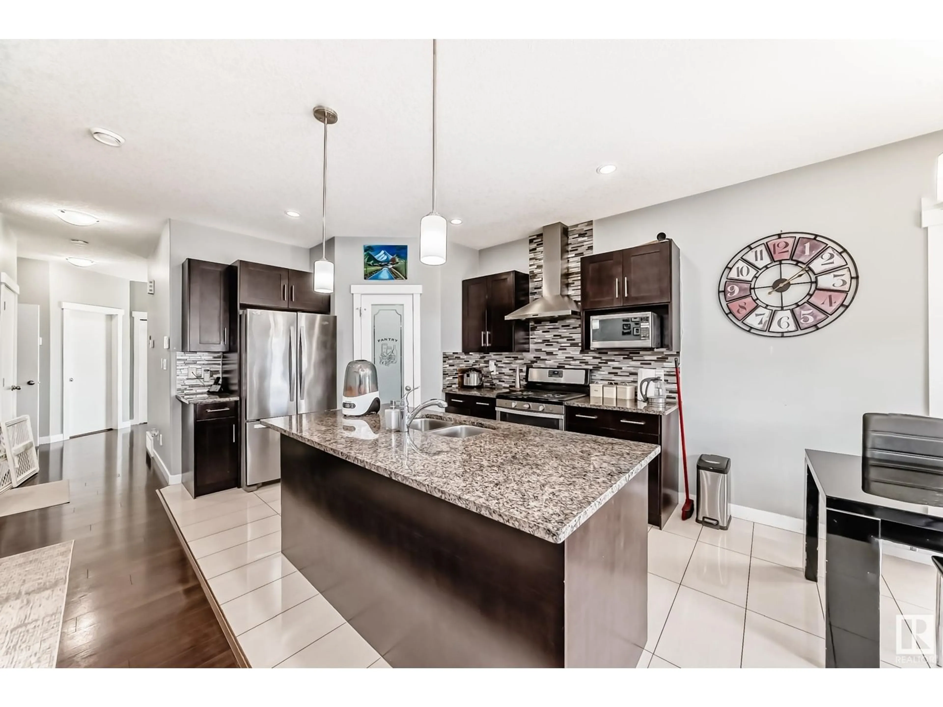 Open concept kitchen, ceramic/tile floor for NW - 16504 132 ST, Edmonton Alberta T6V0J5