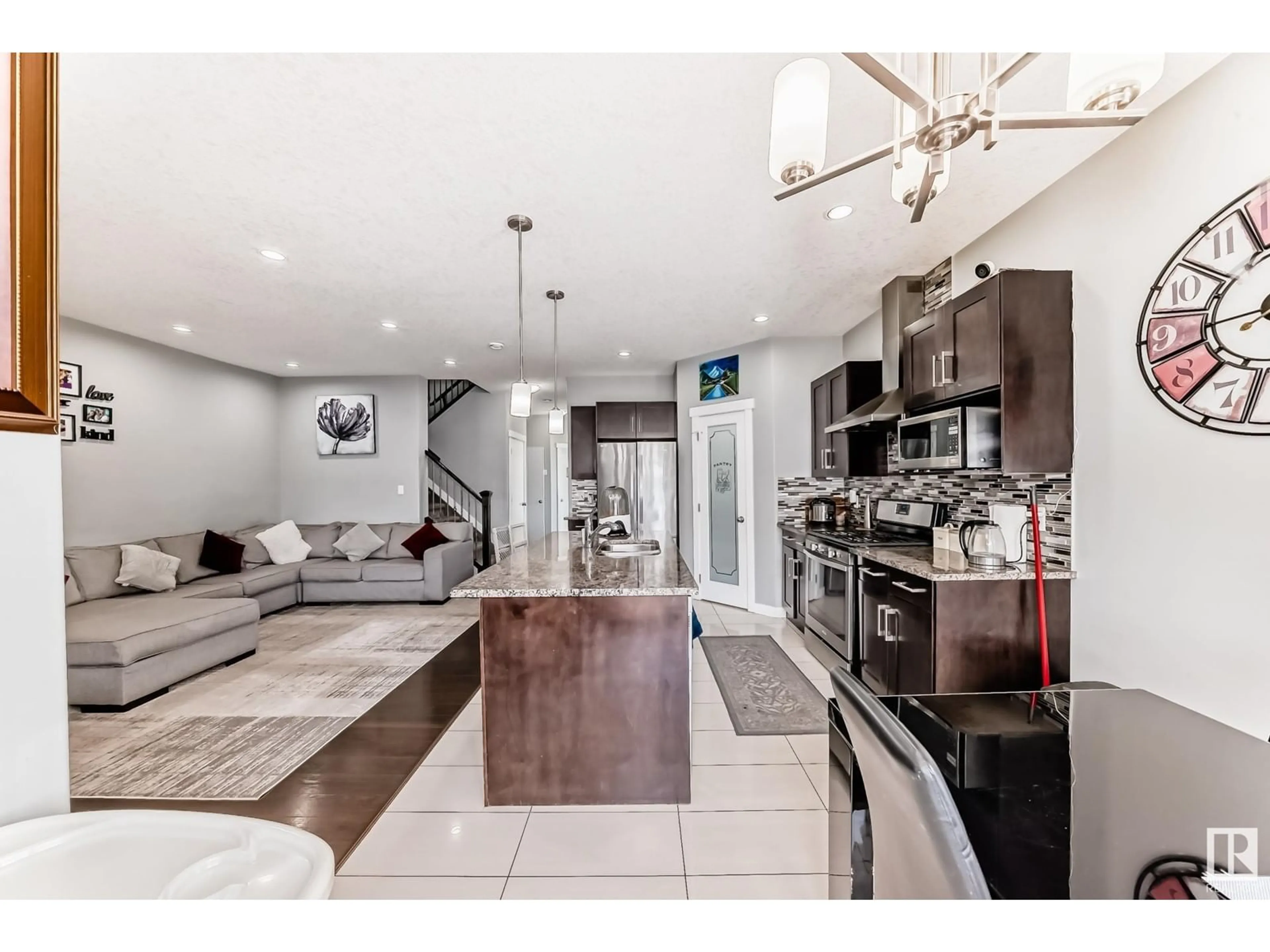 Open concept kitchen, ceramic/tile floor for NW - 16504 132 ST, Edmonton Alberta T6V0J5