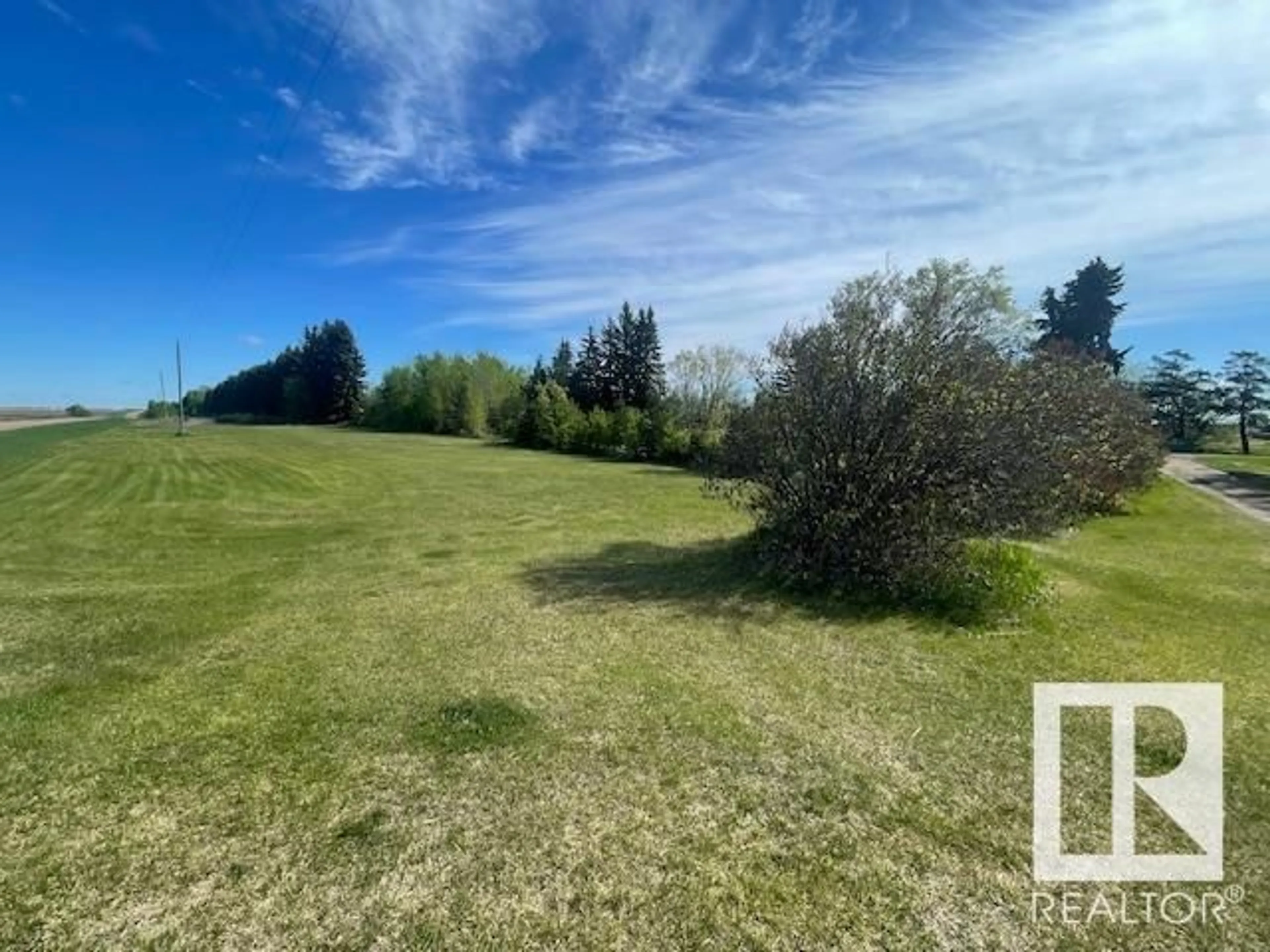 A pic from outside/outdoor area/front of a property/back of a property/a pic from drone, water/lake/river/ocean view for 555049 RANGE ROAD 170, Rural Lamont County Alberta T0V0C0
