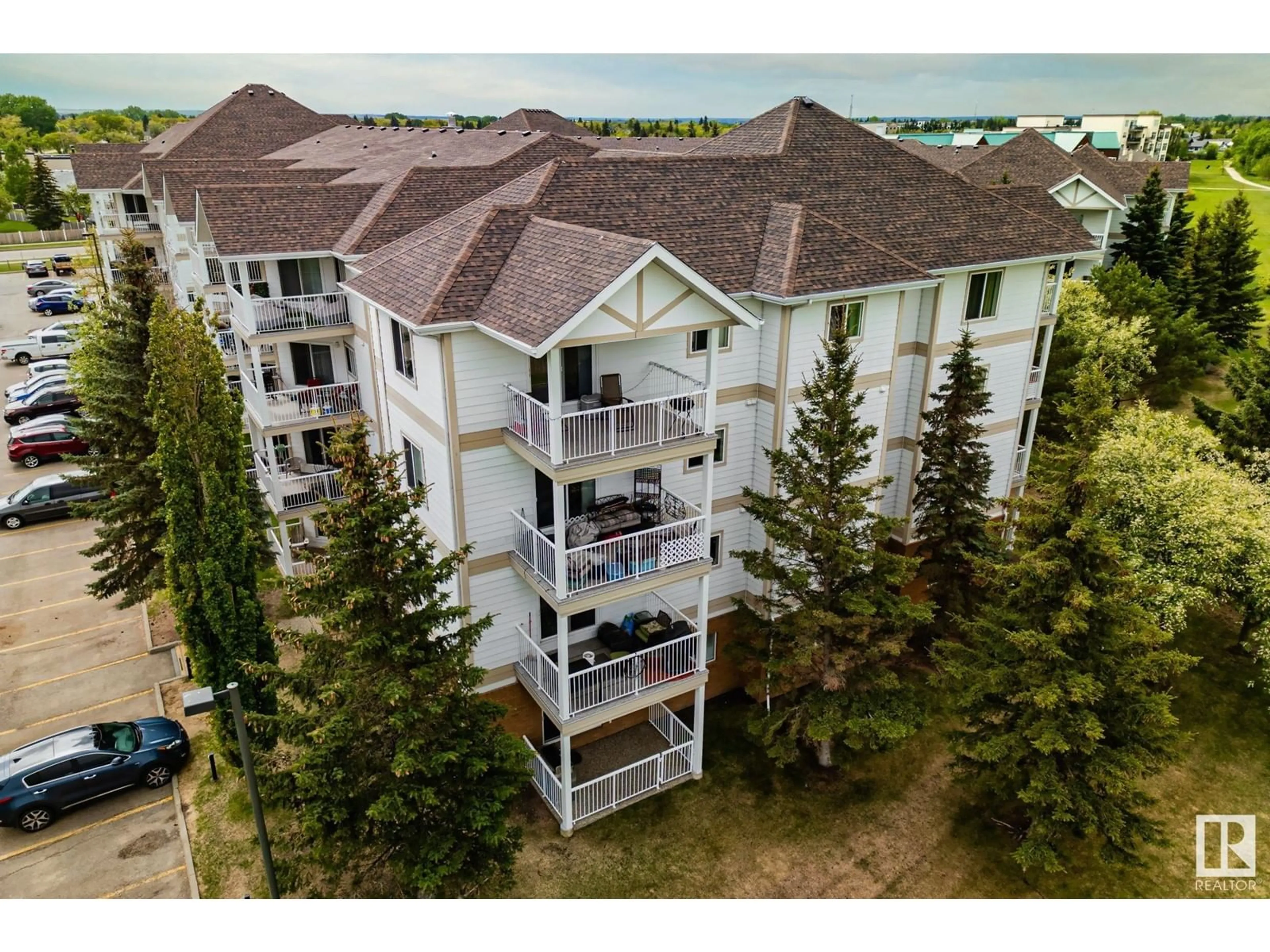 A pic from outside/outdoor area/front of a property/back of a property/a pic from drone, unknown for 411 - 9932 100 AV, Fort Saskatchewan Alberta T8L4L2