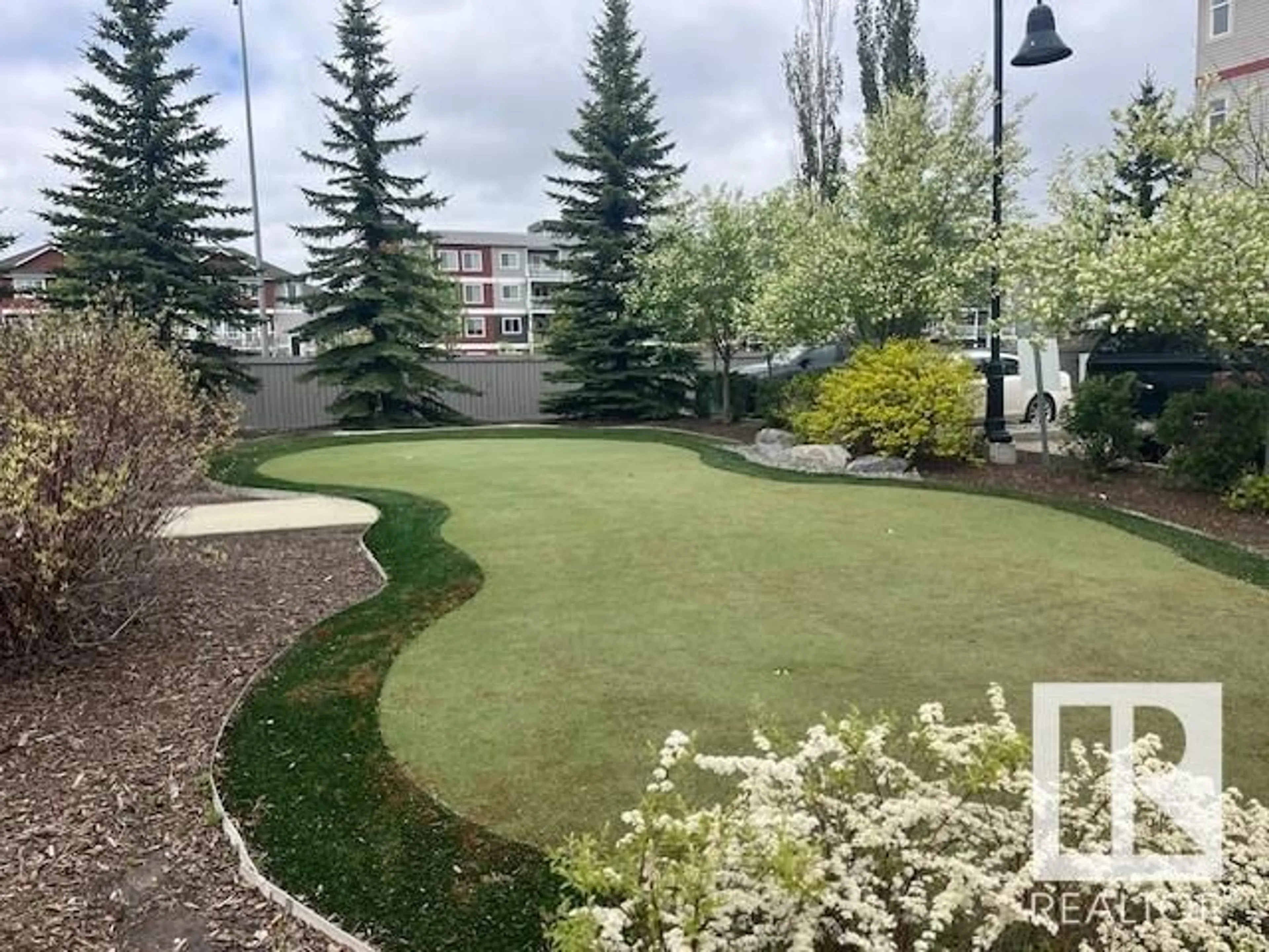 A pic from outside/outdoor area/front of a property/back of a property/a pic from drone, unknown for 404 - 1619 JAMES MOWATT TR, Edmonton Alberta T6W0J7