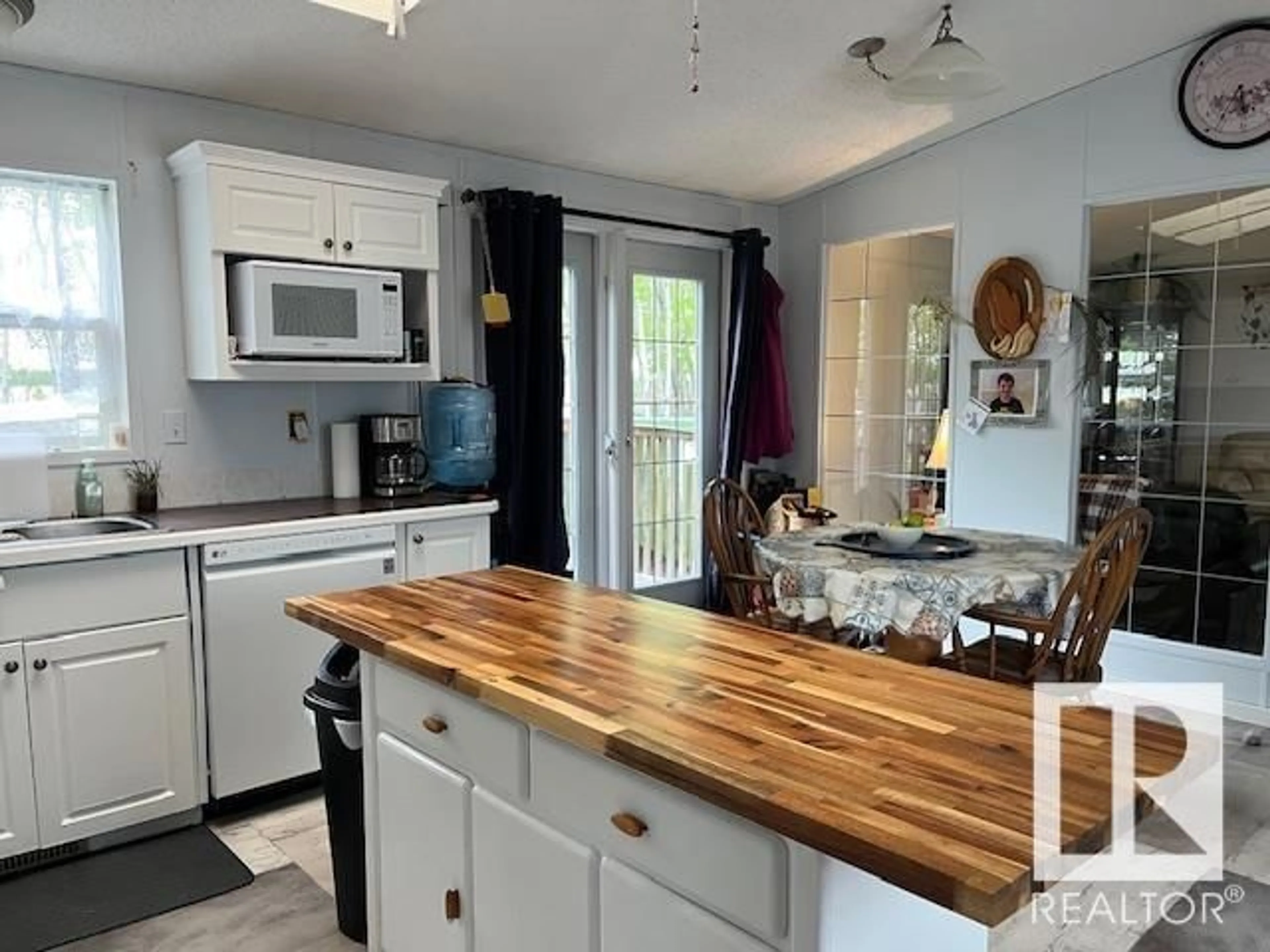 Open concept kitchen, wood/laminate floor for 5005 54 AVE, Glendon Alberta T0A1P0