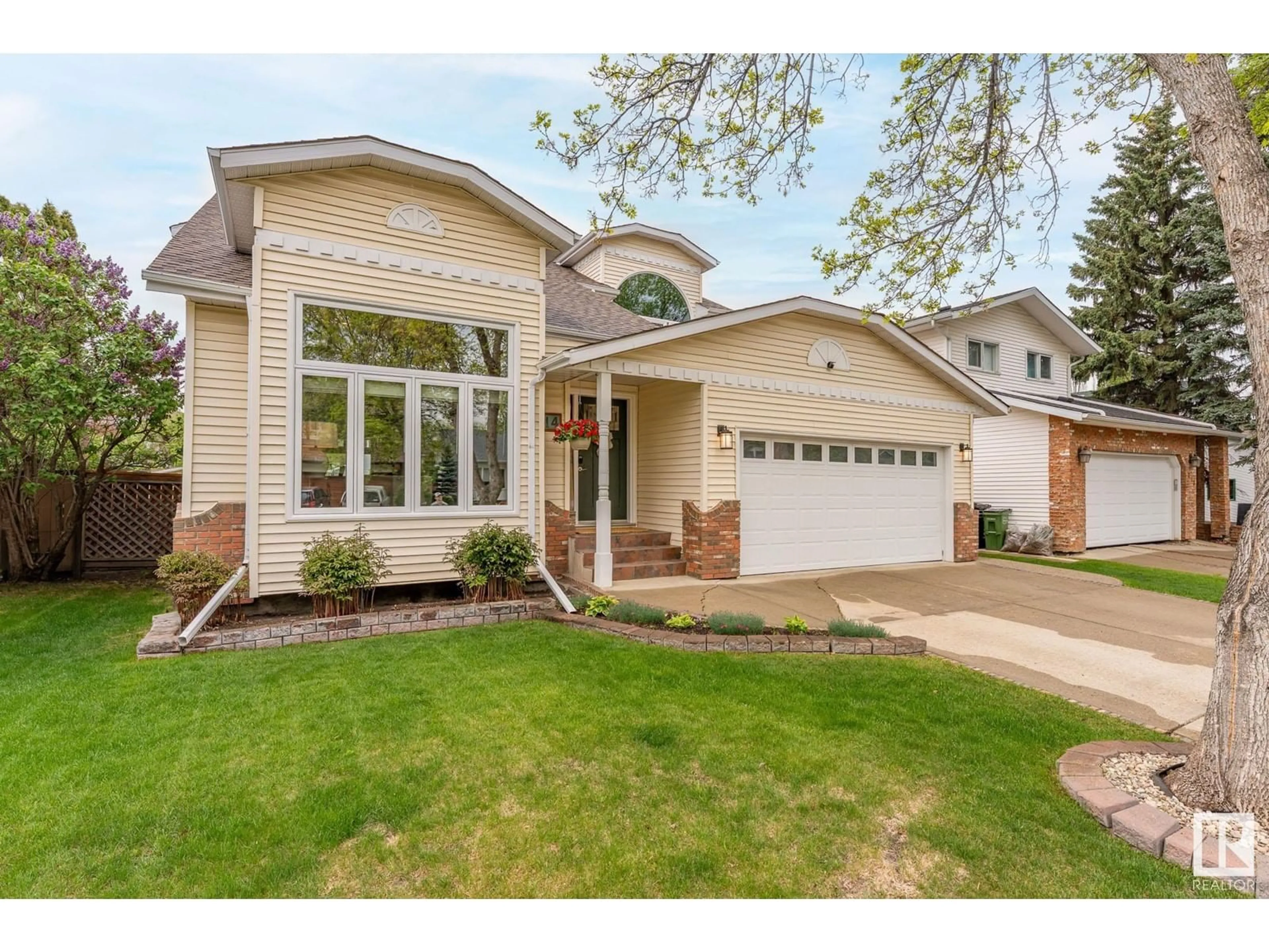 Home with brick exterior material, street for 614 HENDERSON ST, Edmonton Alberta T6R1S4