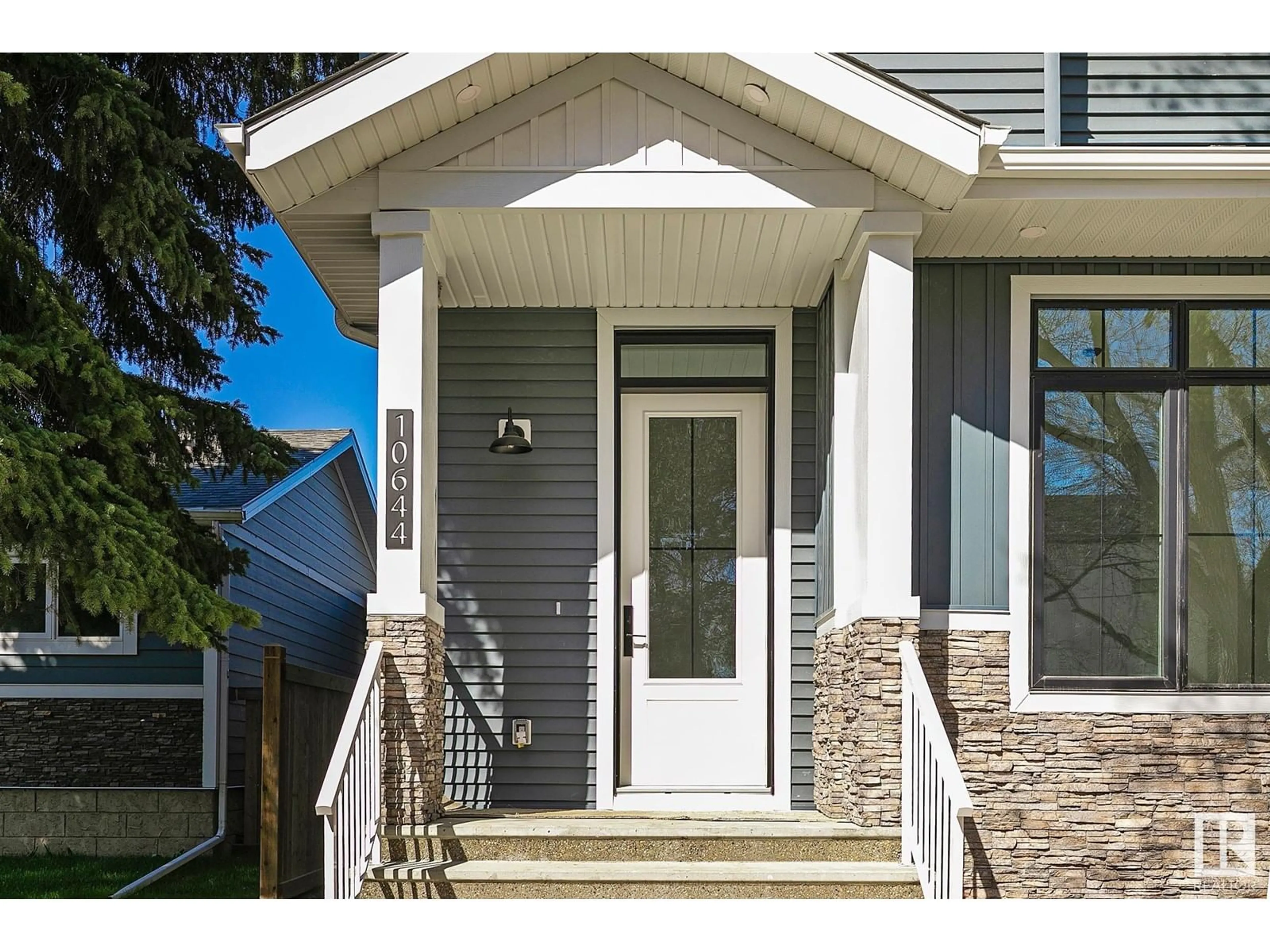 Home with vinyl exterior material, street for NW - 10644 10646 144 ST, Edmonton Alberta T5N2V6
