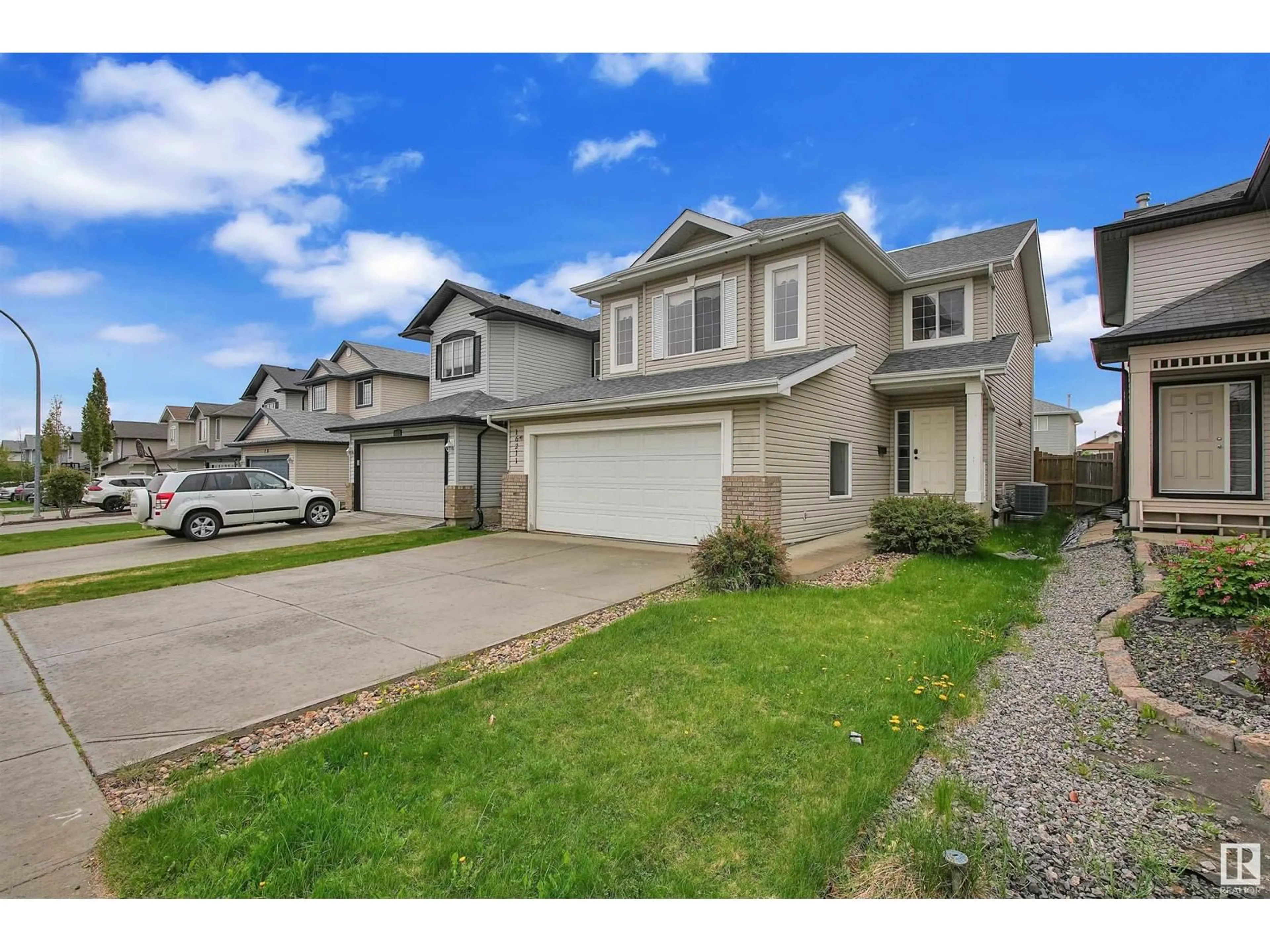 A pic from outside/outdoor area/front of a property/back of a property/a pic from drone, street for 16211 49 ST, Edmonton Alberta T5Y3H5