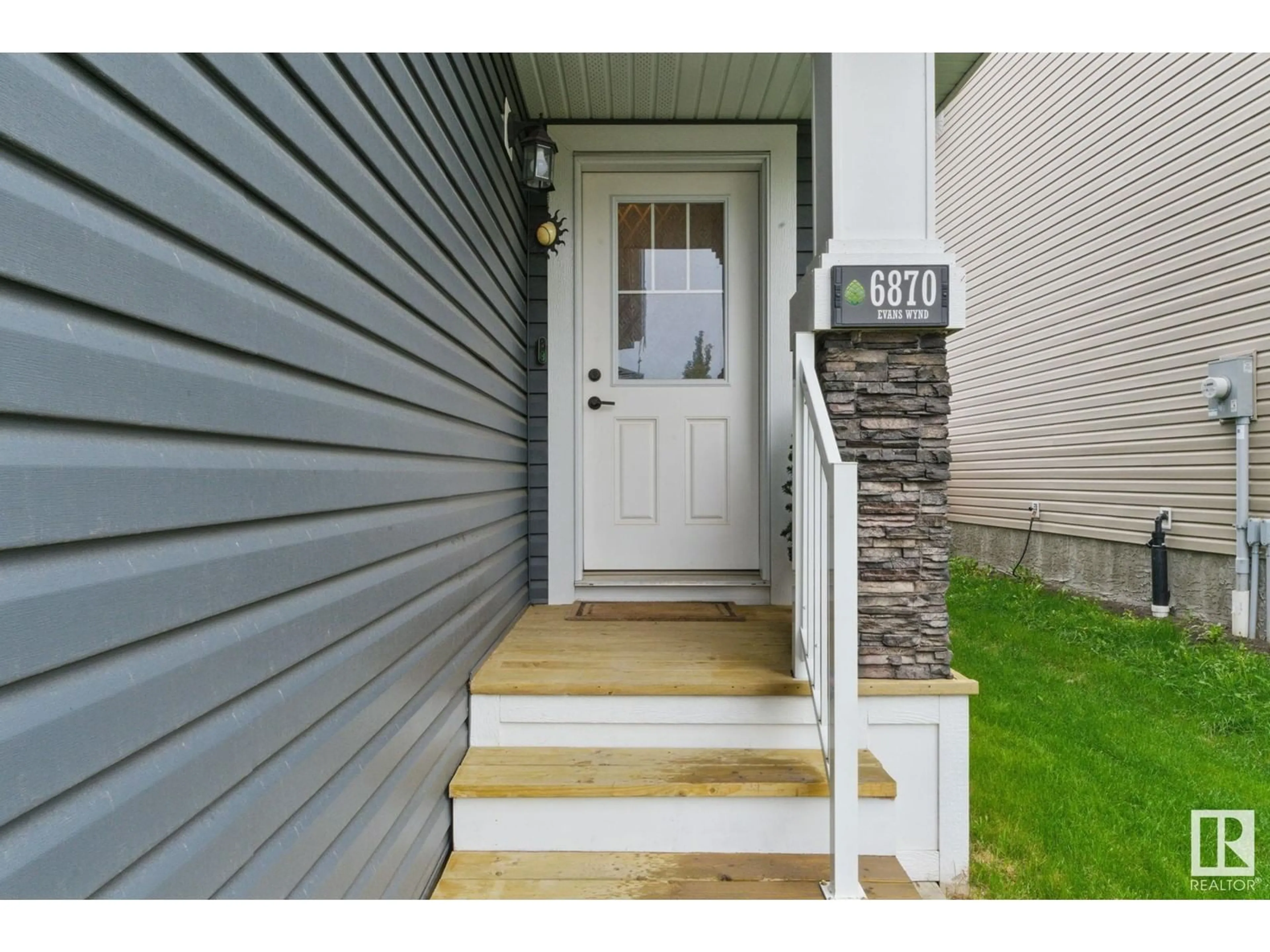 Indoor entryway for NW - 6870 EVANS WD, Edmonton Alberta T6M0T8