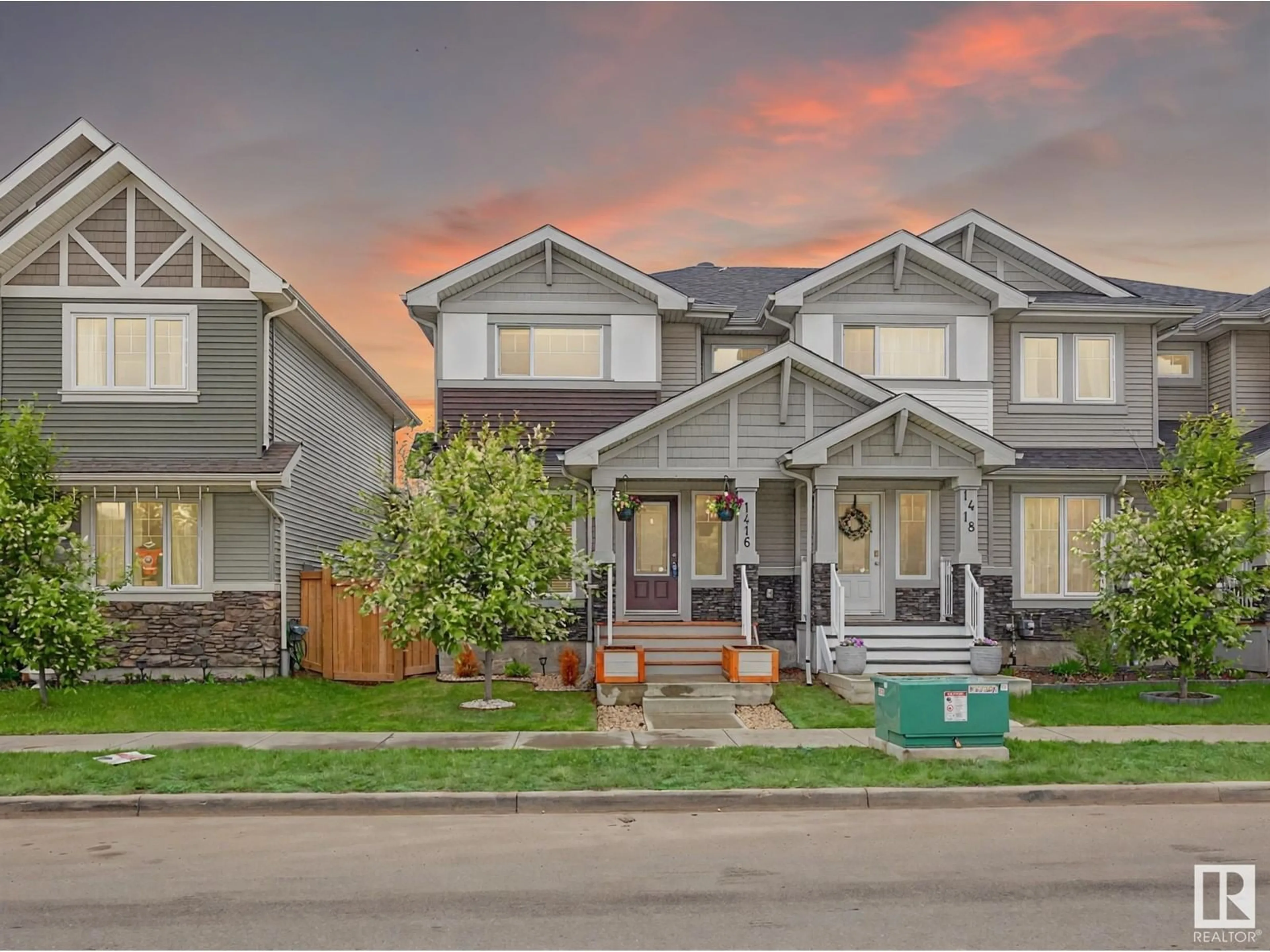 Home with vinyl exterior material, street for 1416 MCCONACHIE BV, Edmonton Alberta T5Y3X2
