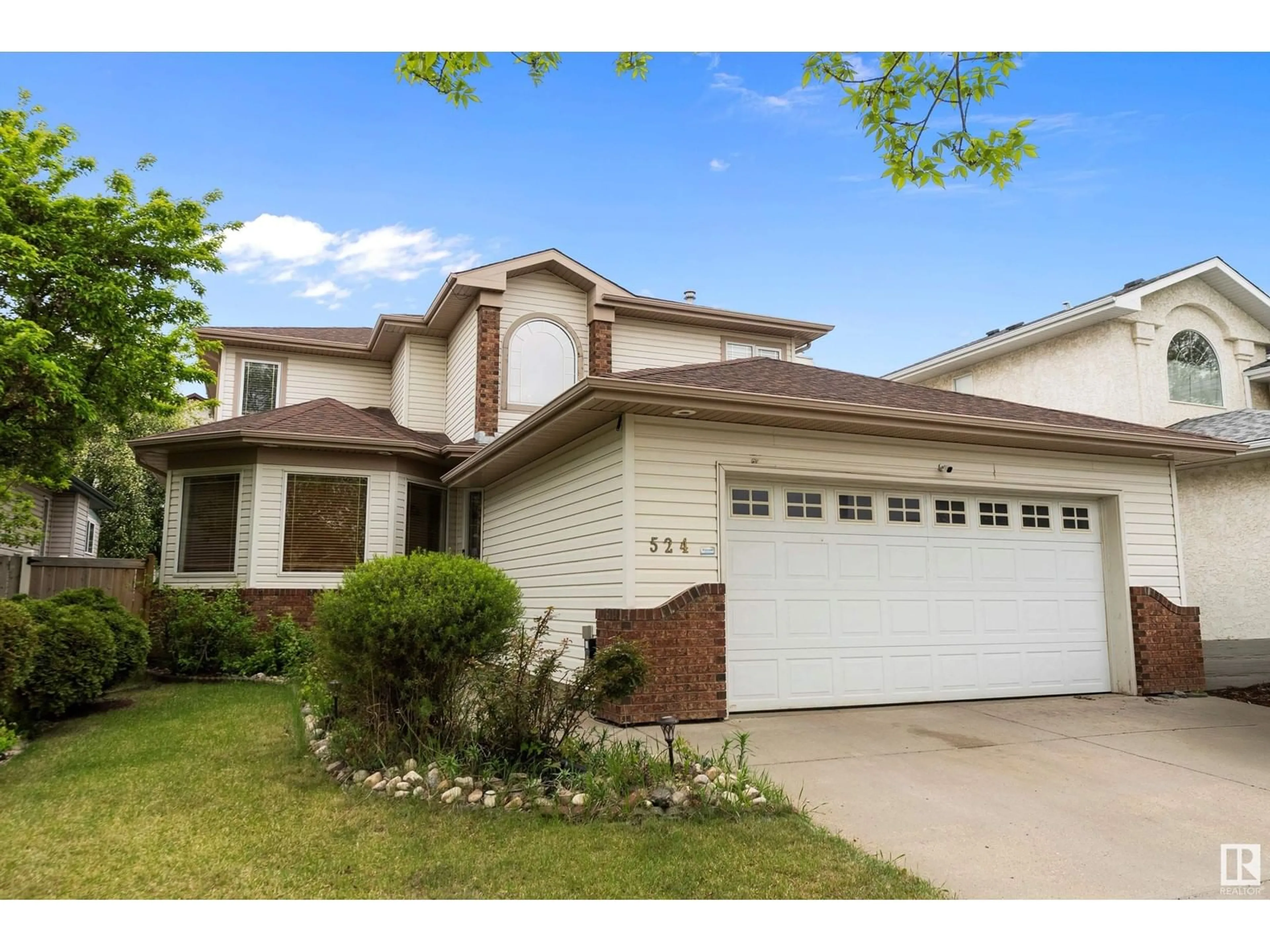 Home with vinyl exterior material, street for 524 ORMSBY RD, Edmonton Alberta T5T6G8