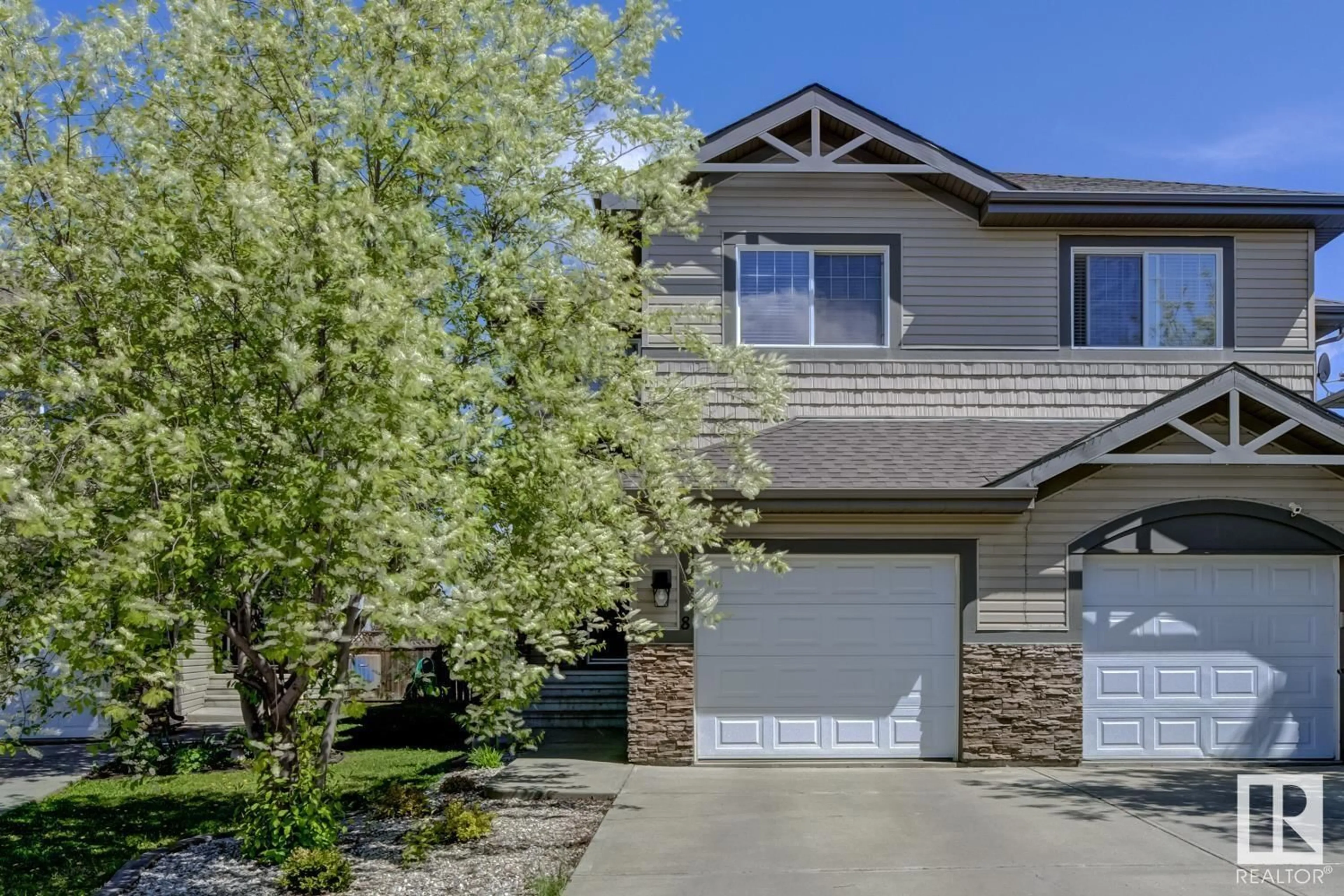 Home with vinyl exterior material, street for 8 HARTWICK LO, Spruce Grove Alberta T7X0A5