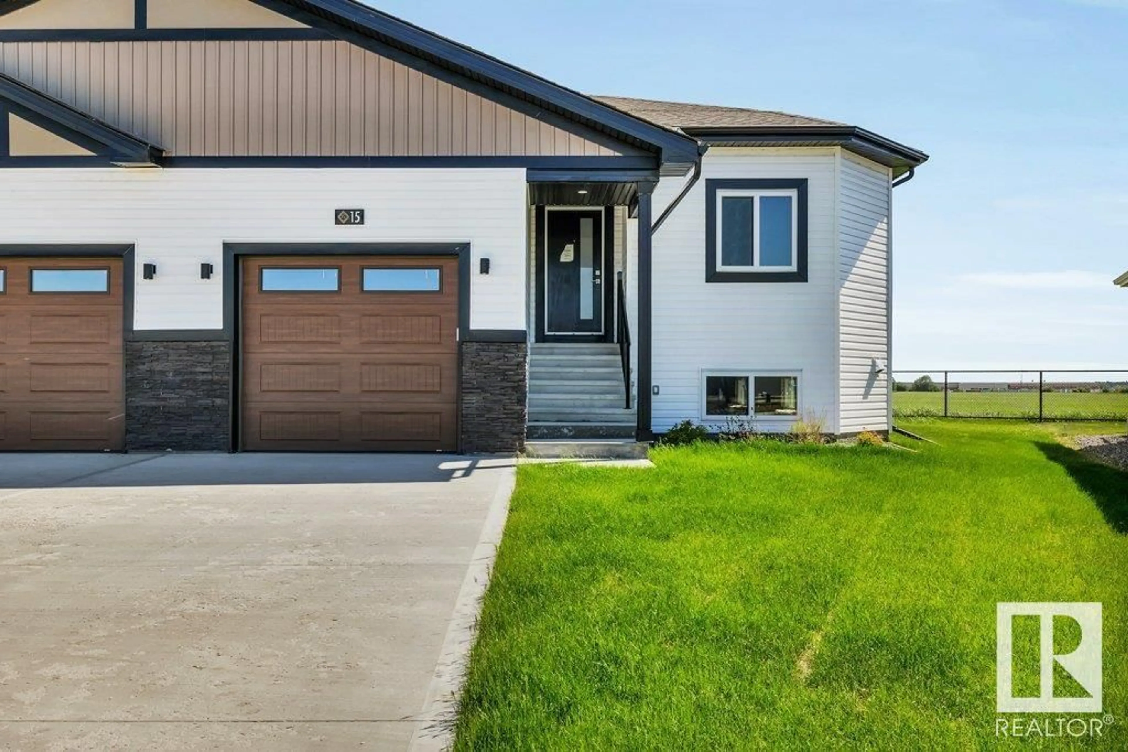 Home with vinyl exterior material, street for #15 - 6519 46 ST, Wetaskiwin Alberta T9A1Y5