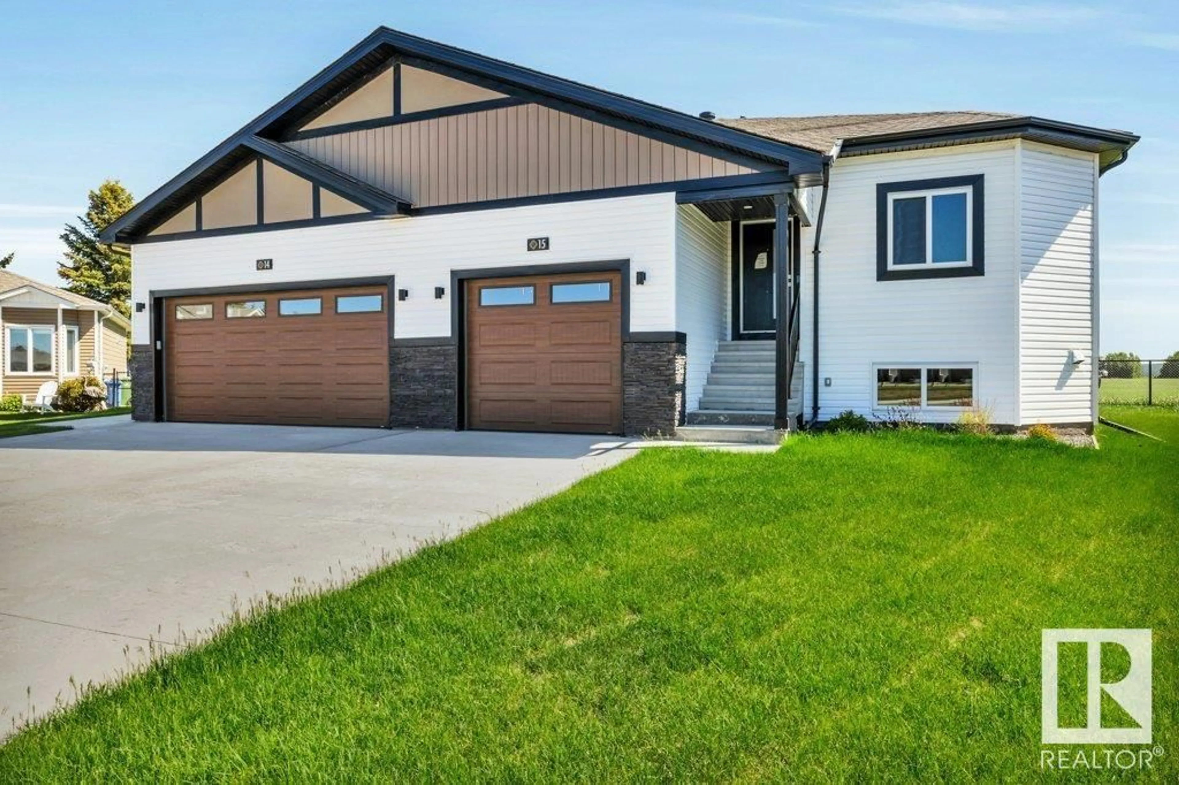 Home with vinyl exterior material, street for #15 - 6519 46 ST, Wetaskiwin Alberta T9A1Y5
